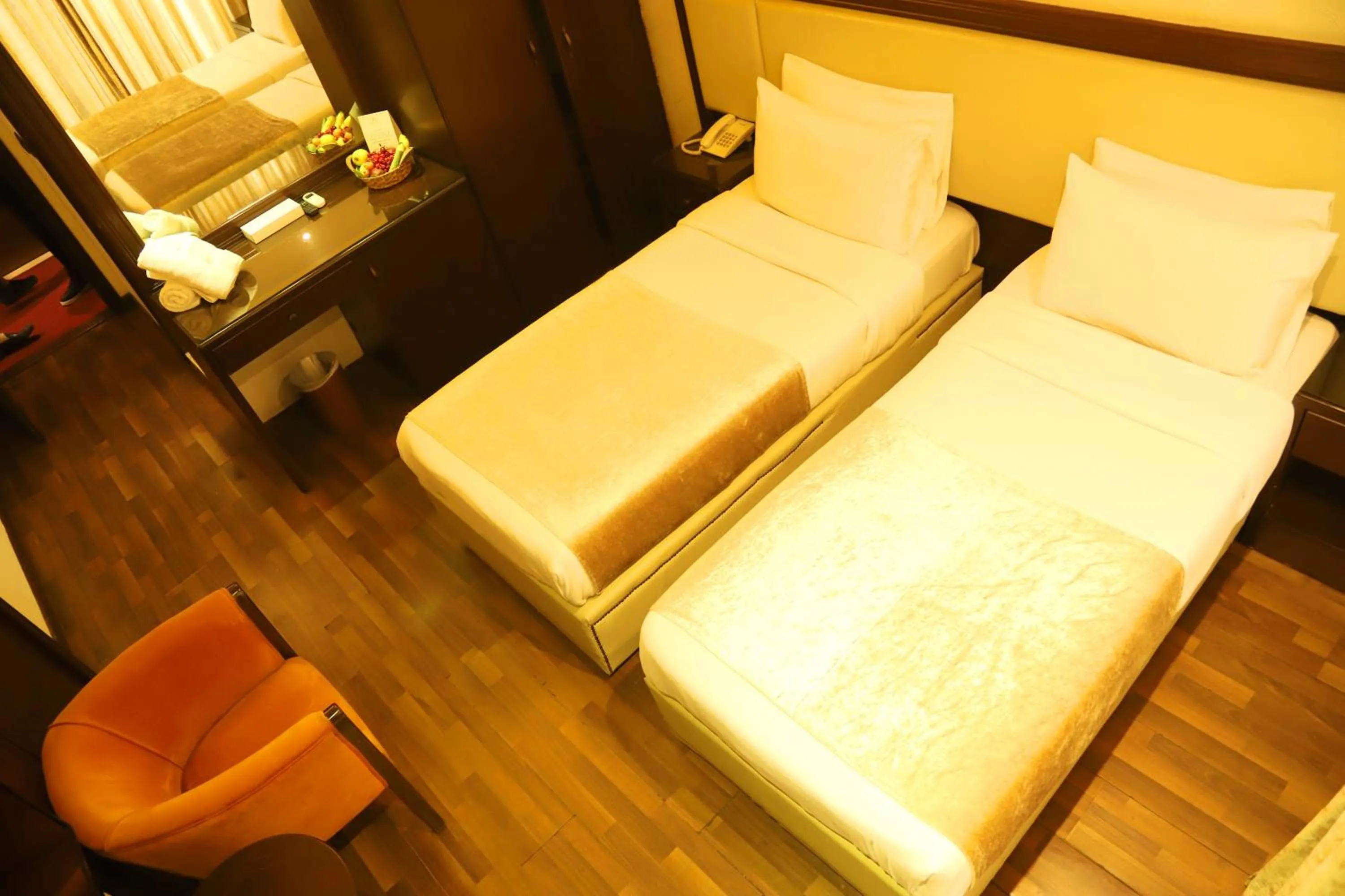 Bed in Royal Garden Hotel