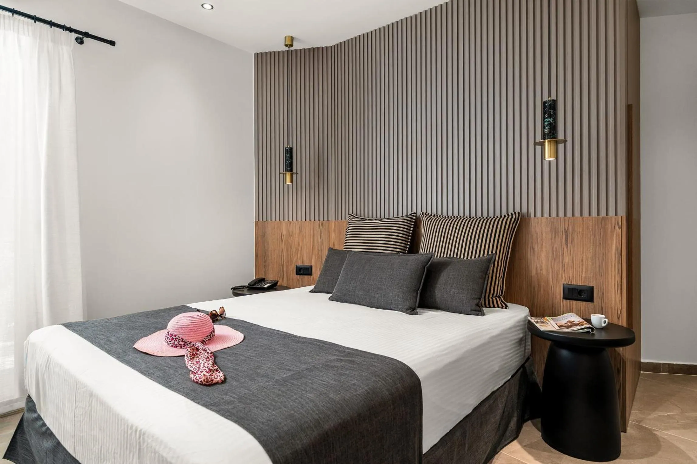 Bed in Glaros Hotel Apartment