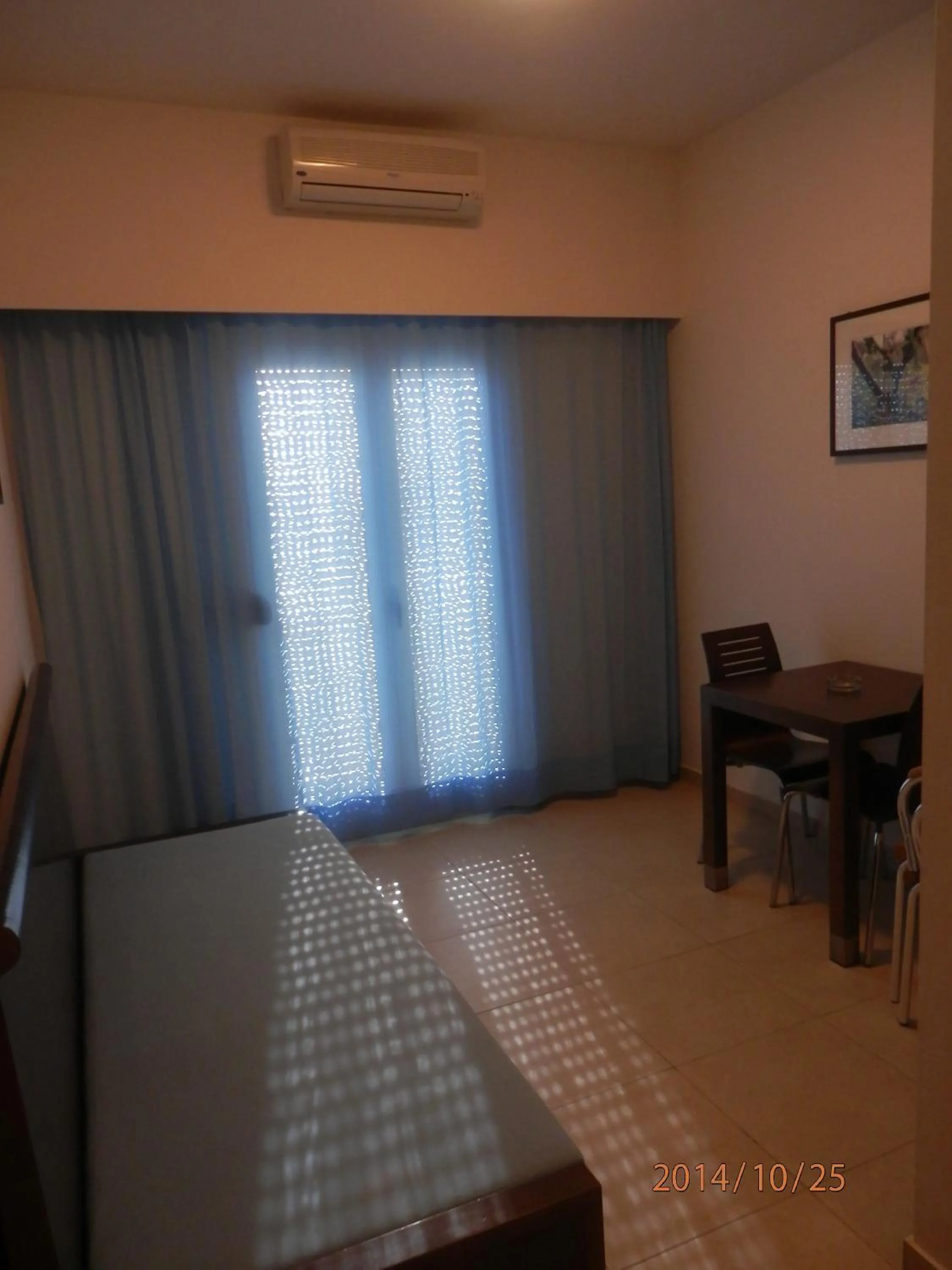 Bed in Glaros Hotel Apartment