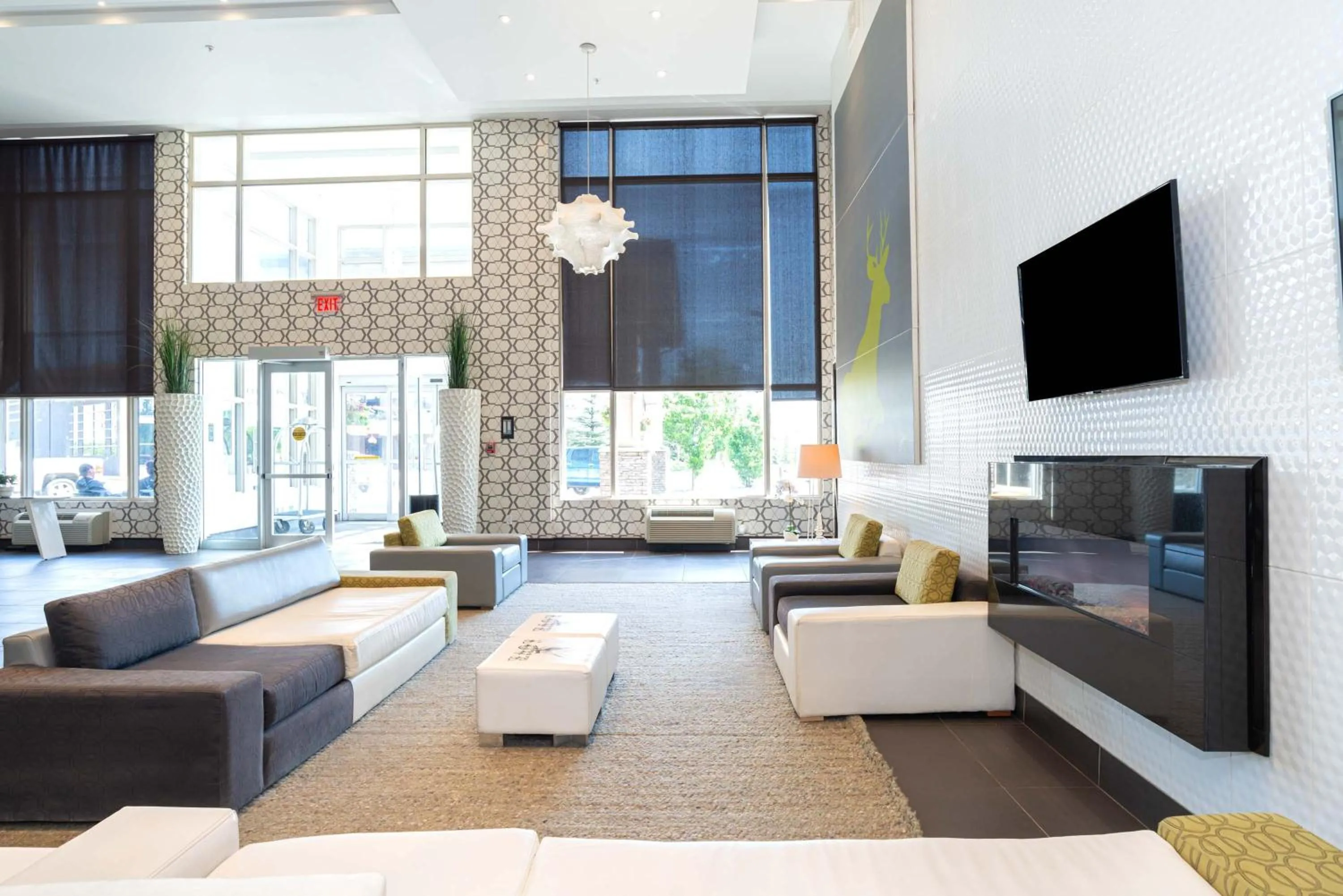 Lobby or reception, Bed in Sandman Hotel & Suites Calgary South