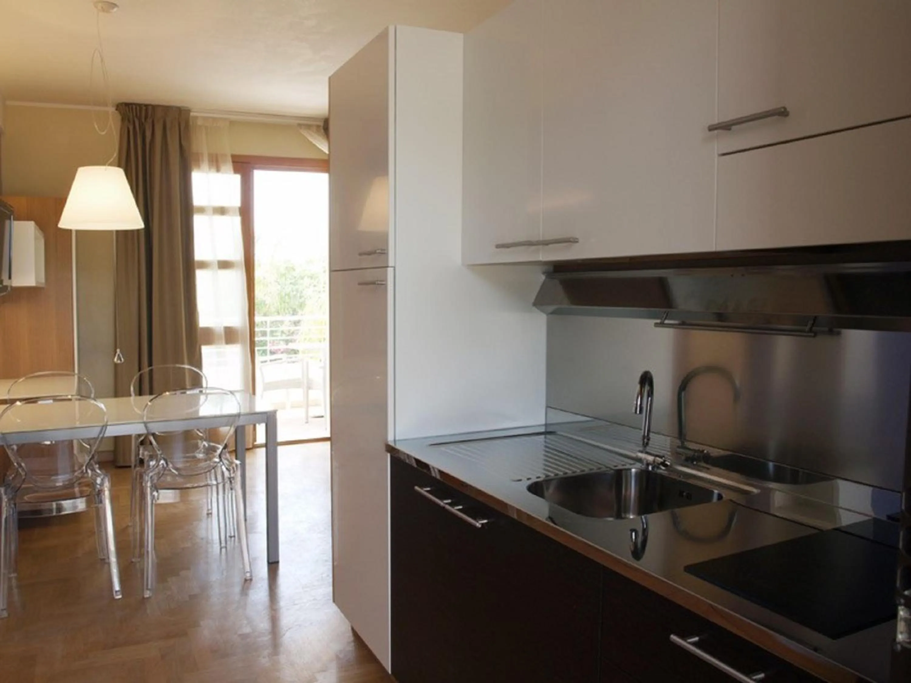 Kitchen or kitchenette in Santa Caterina Resort