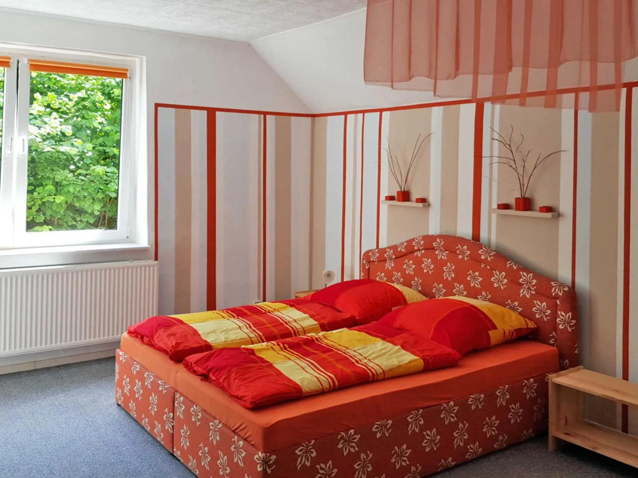 Bed in Ferienwohnung Seeluster Bucht