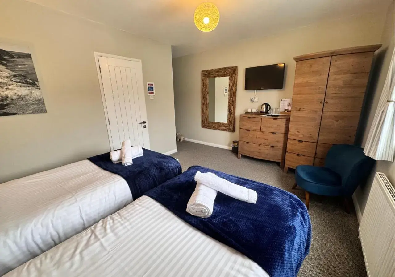 Standard Twin Room with Garden View in The Waterfront Inn Standard Twin Room with Garden View in The Waterfront Inn