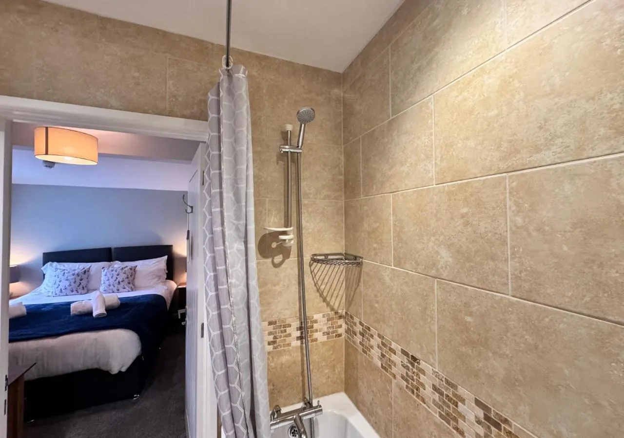 Bed in The Waterfront Inn