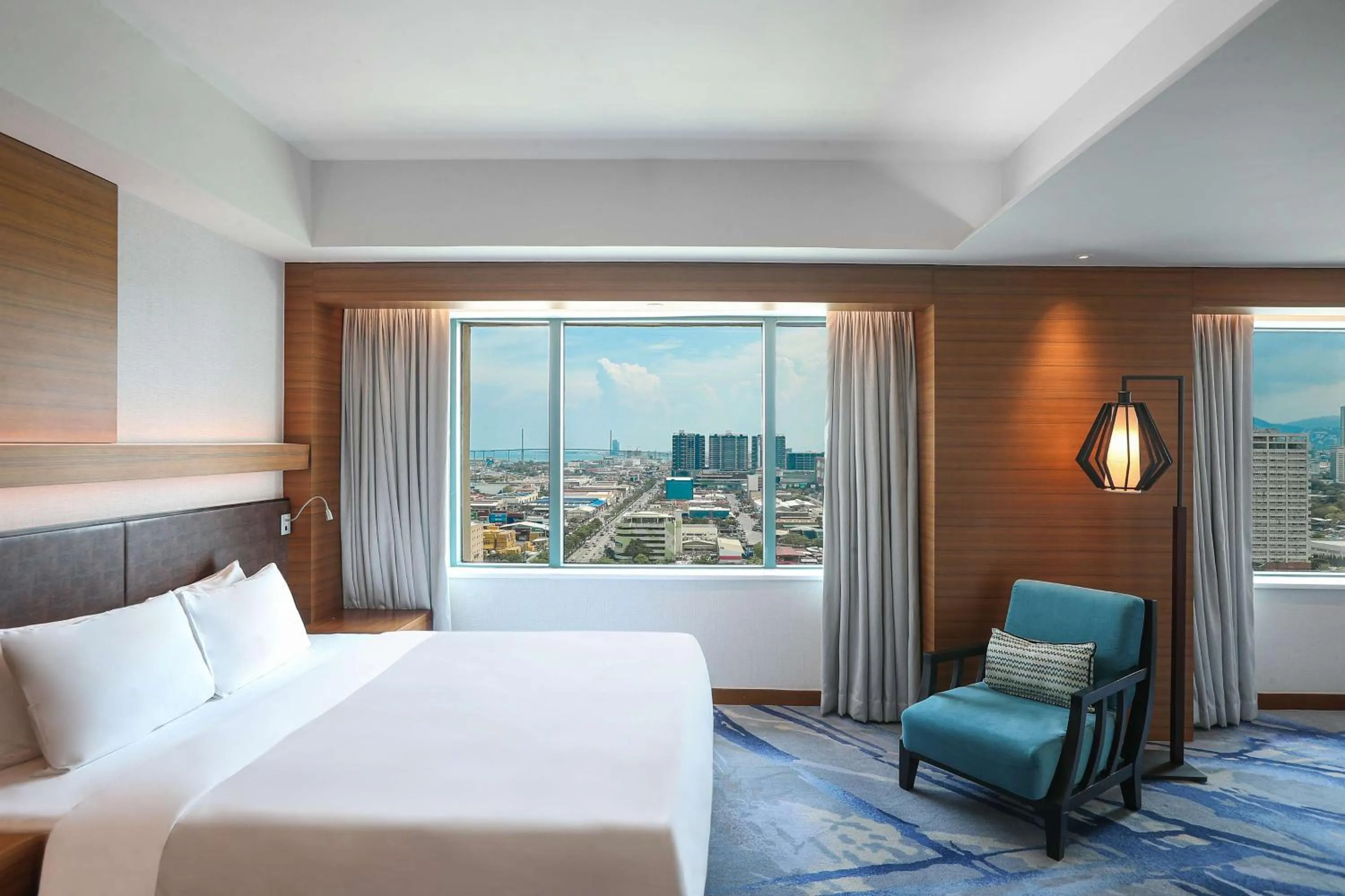 Photo of the whole room, Bed in Radisson Blu Cebu