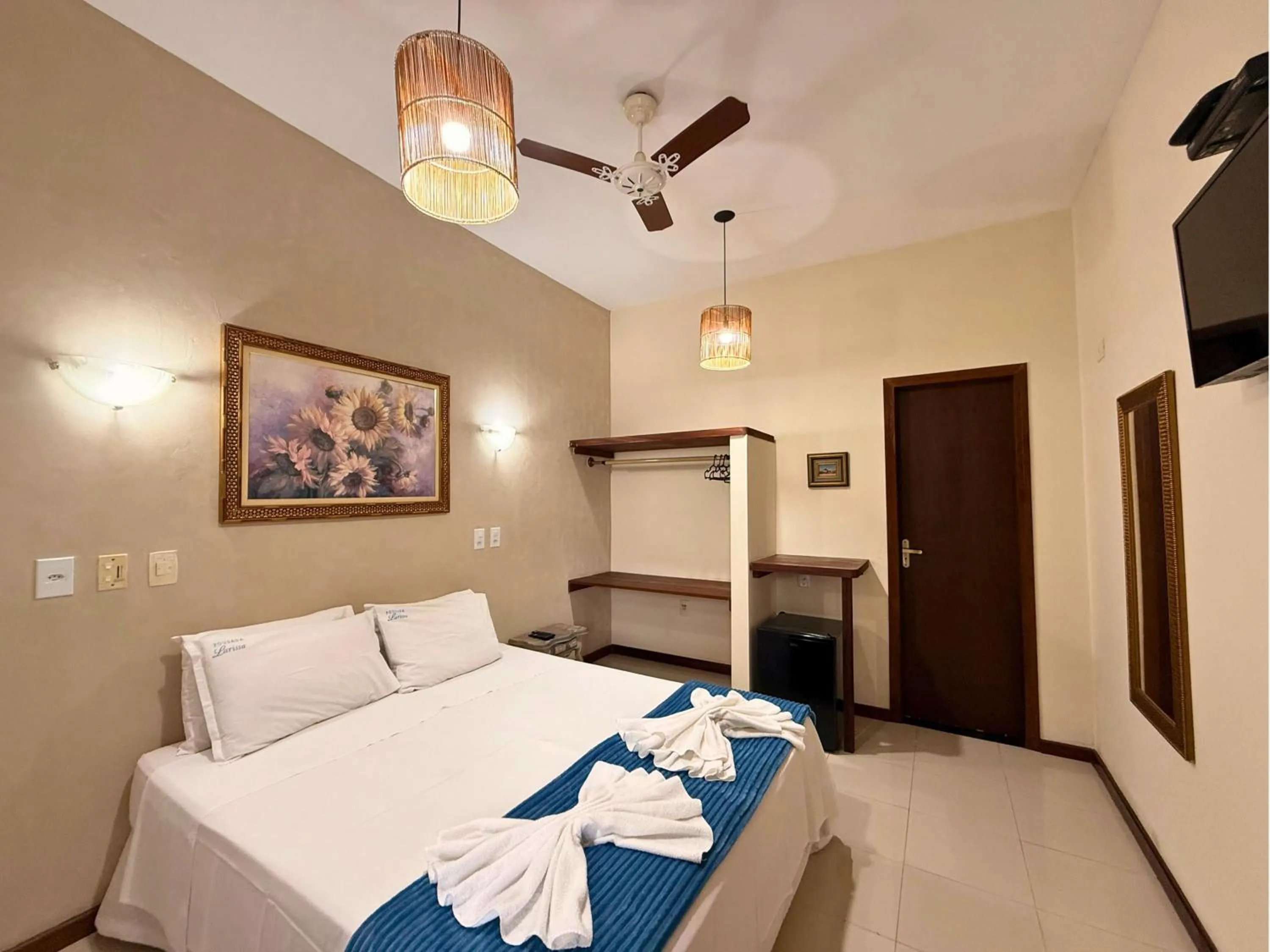 Bed in Pousada Larissa - com Gerador de Energia