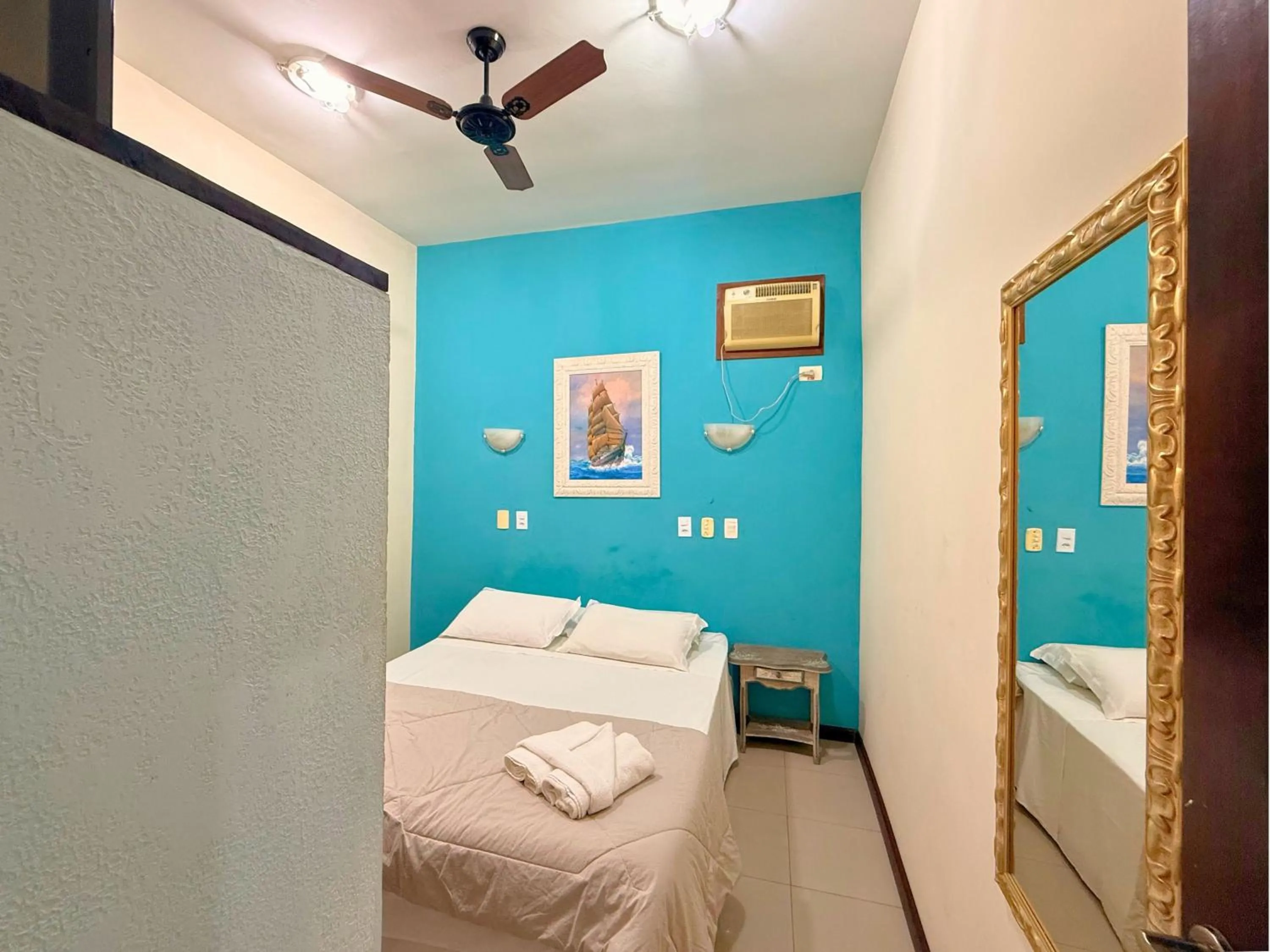 Bed in Pousada Larissa - com Gerador de Energia