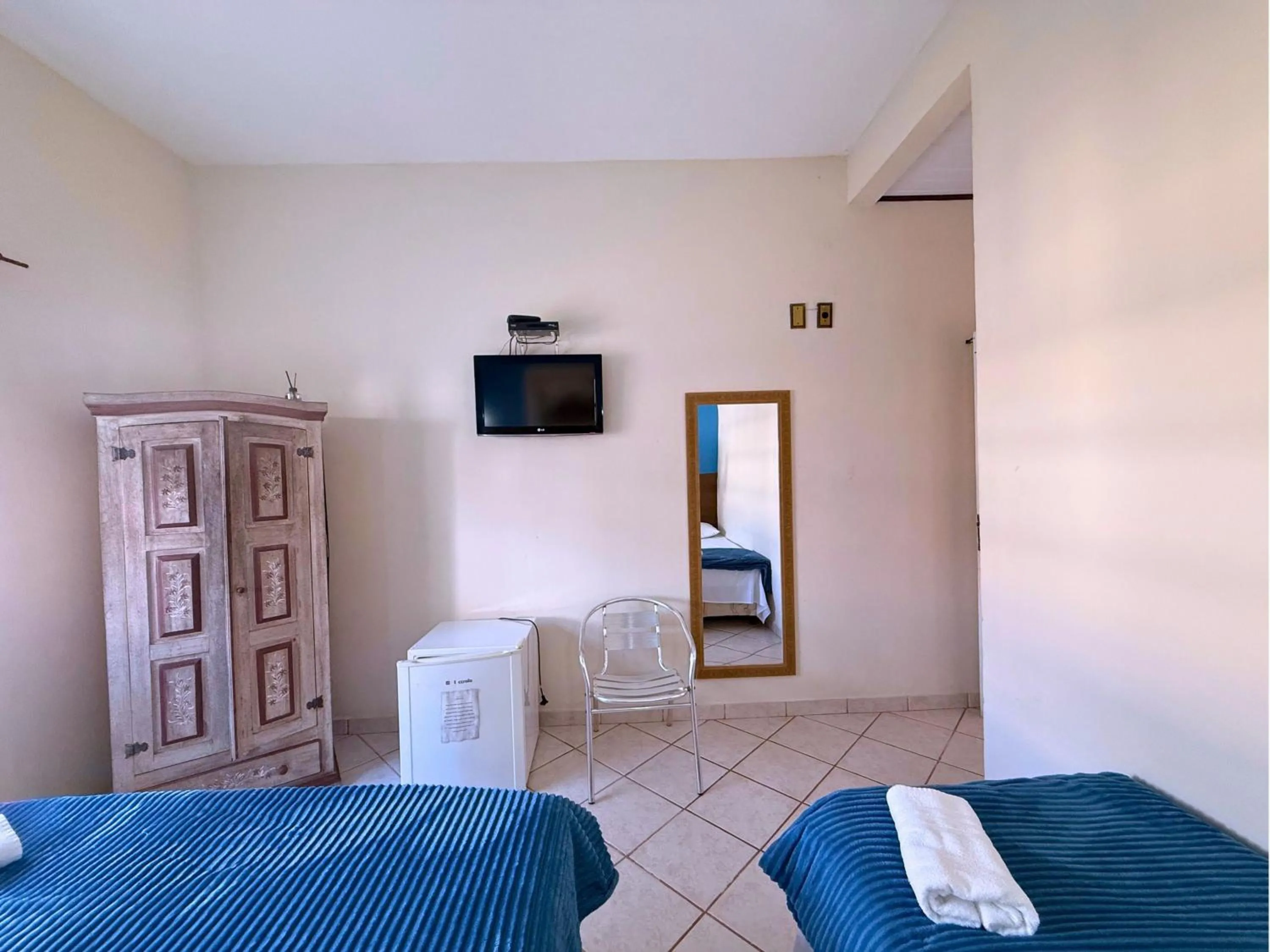 Bed in Pousada Larissa - com Gerador de Energia