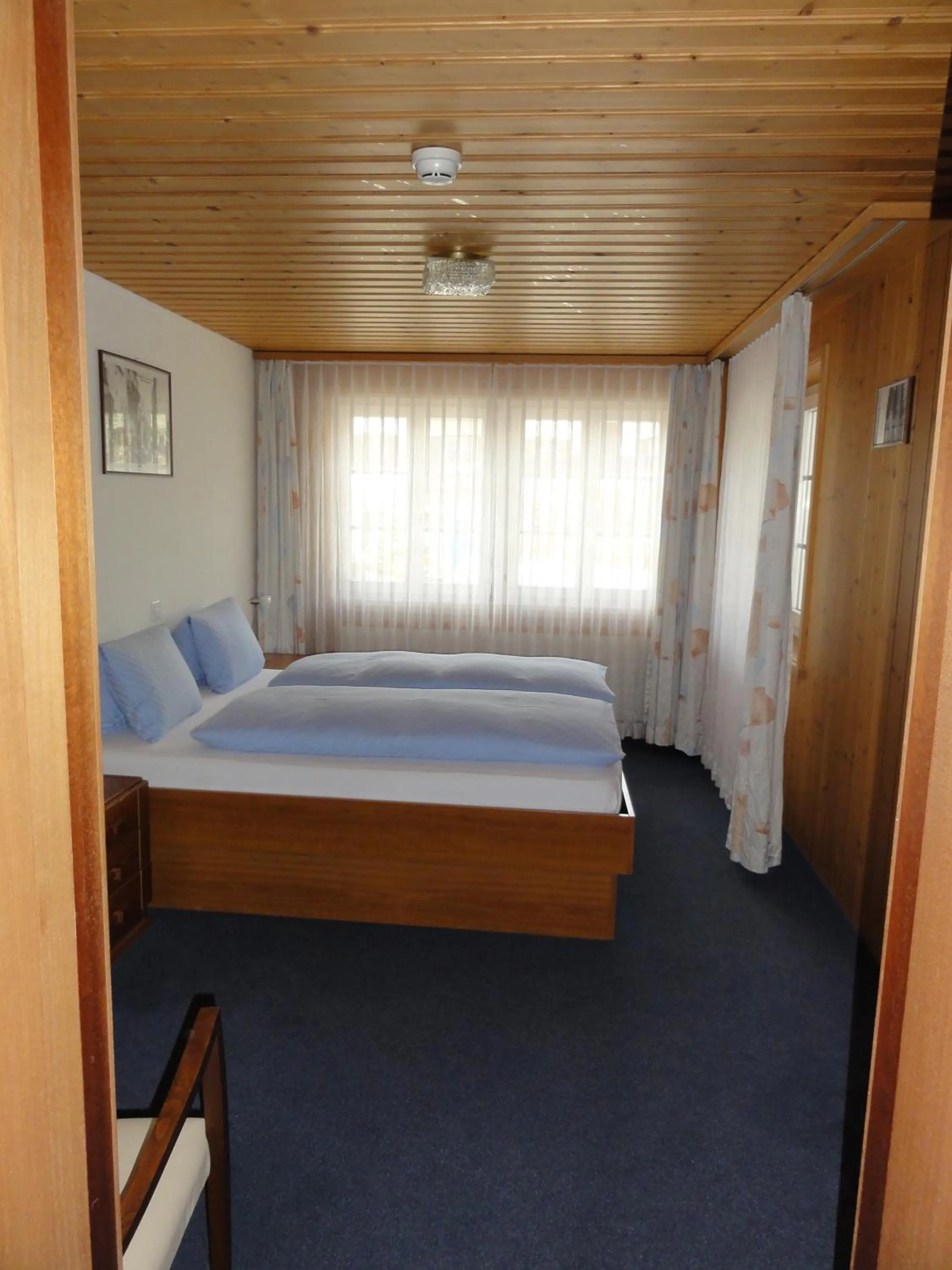 Bed in Hotel Steinbock Grindelwald