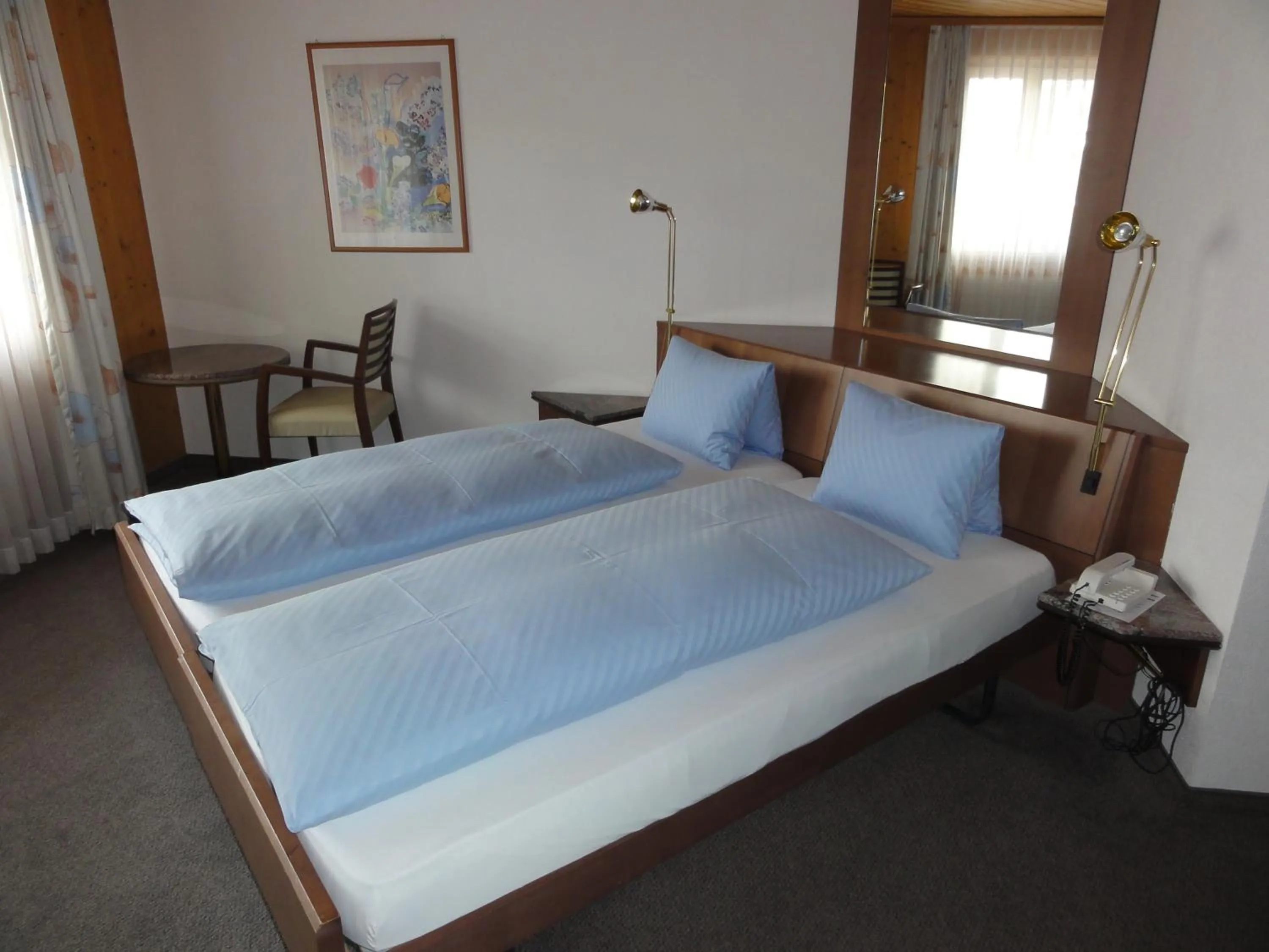 Bed in Hotel Steinbock Grindelwald