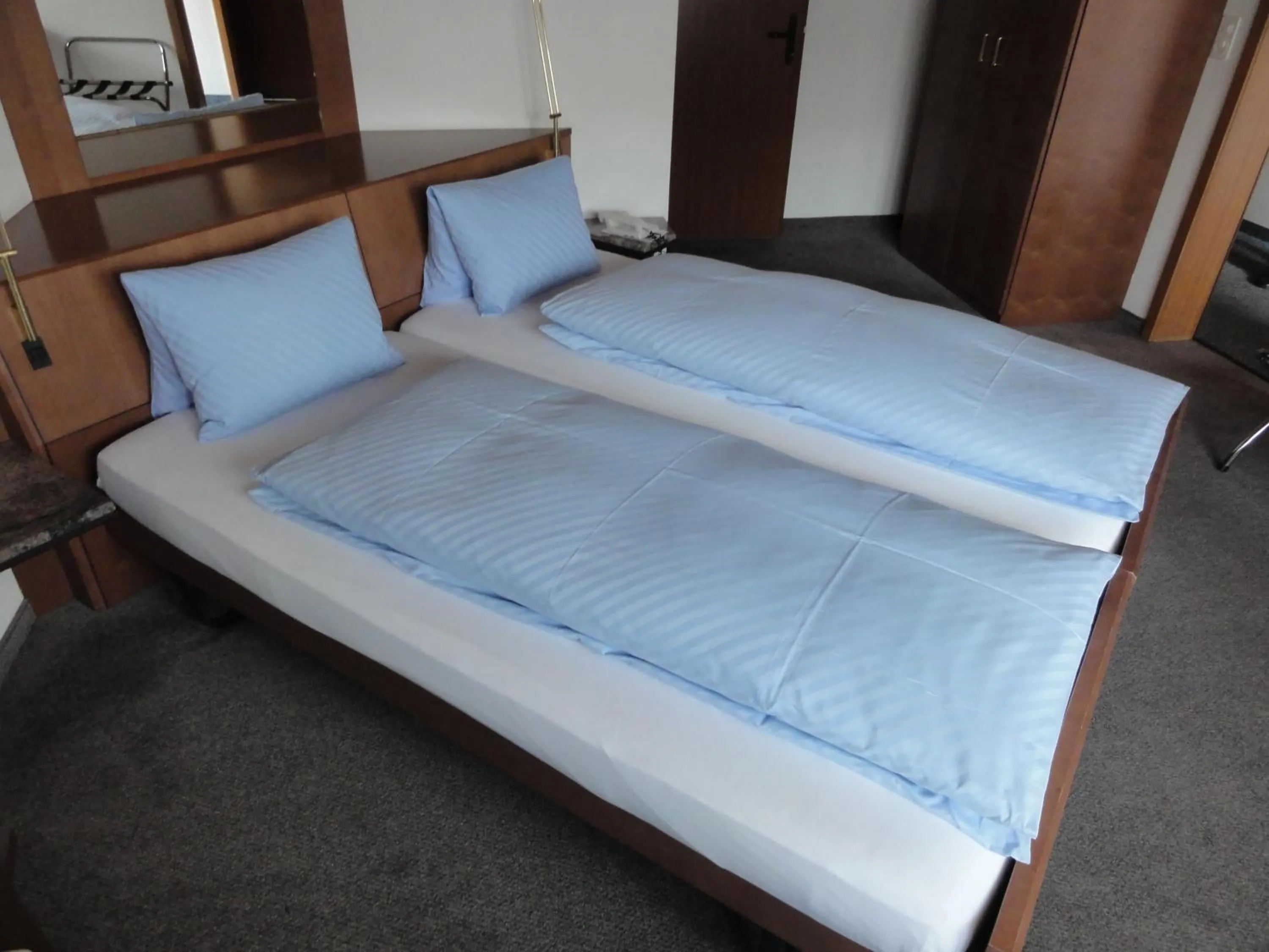 Bed in Hotel Steinbock Grindelwald