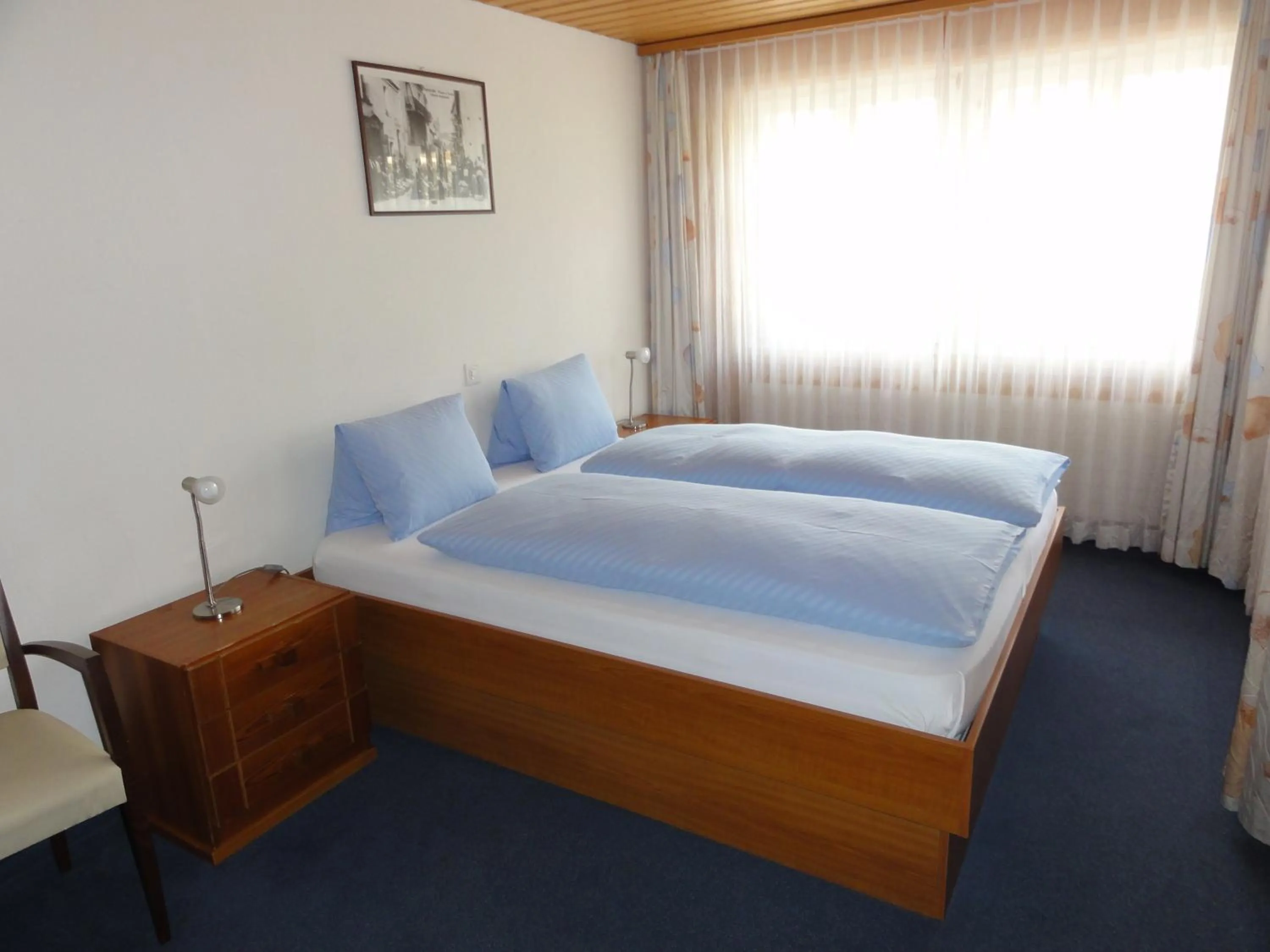 Bed in Hotel Steinbock Grindelwald