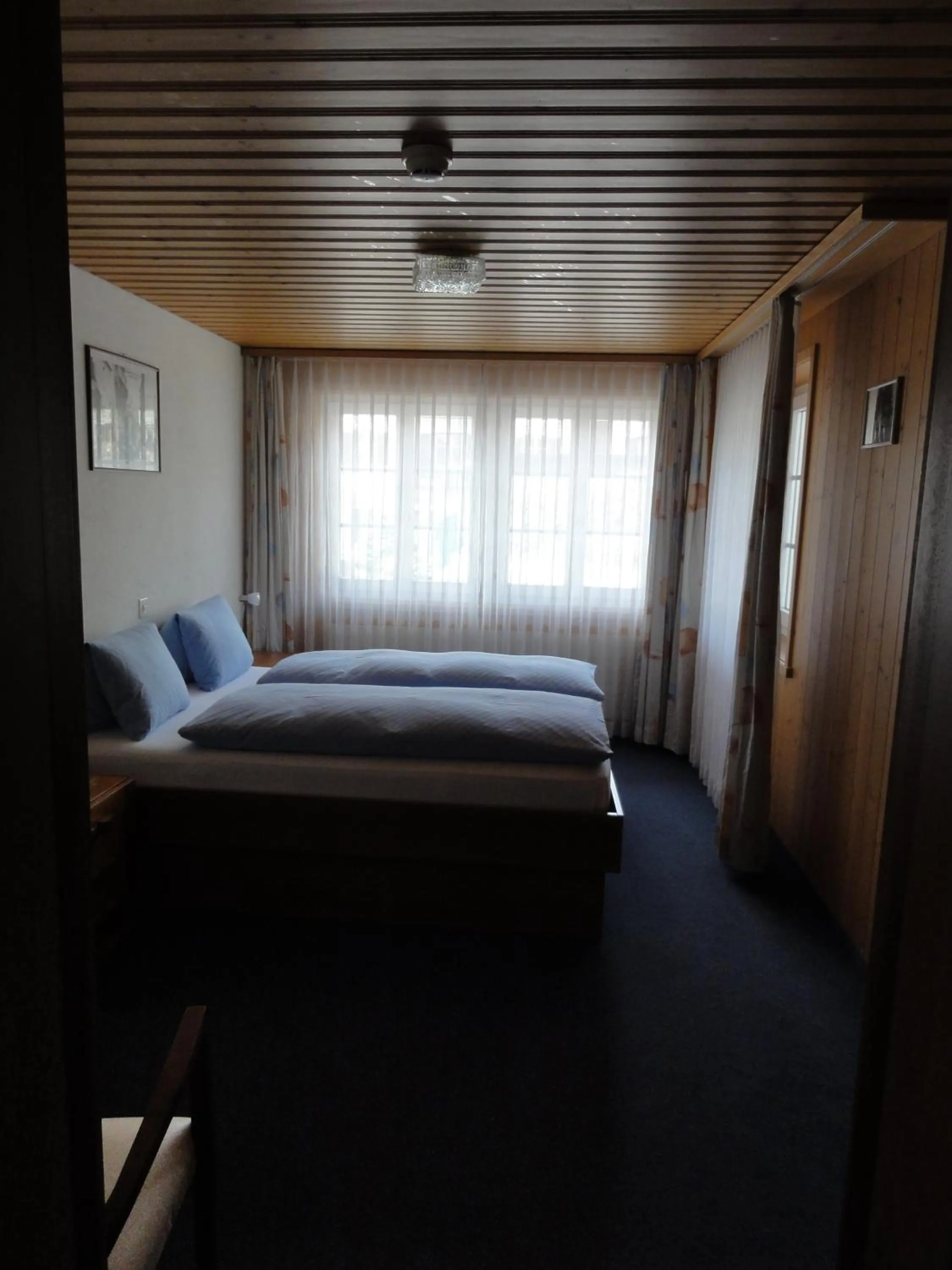 Bed in Hotel Steinbock Grindelwald