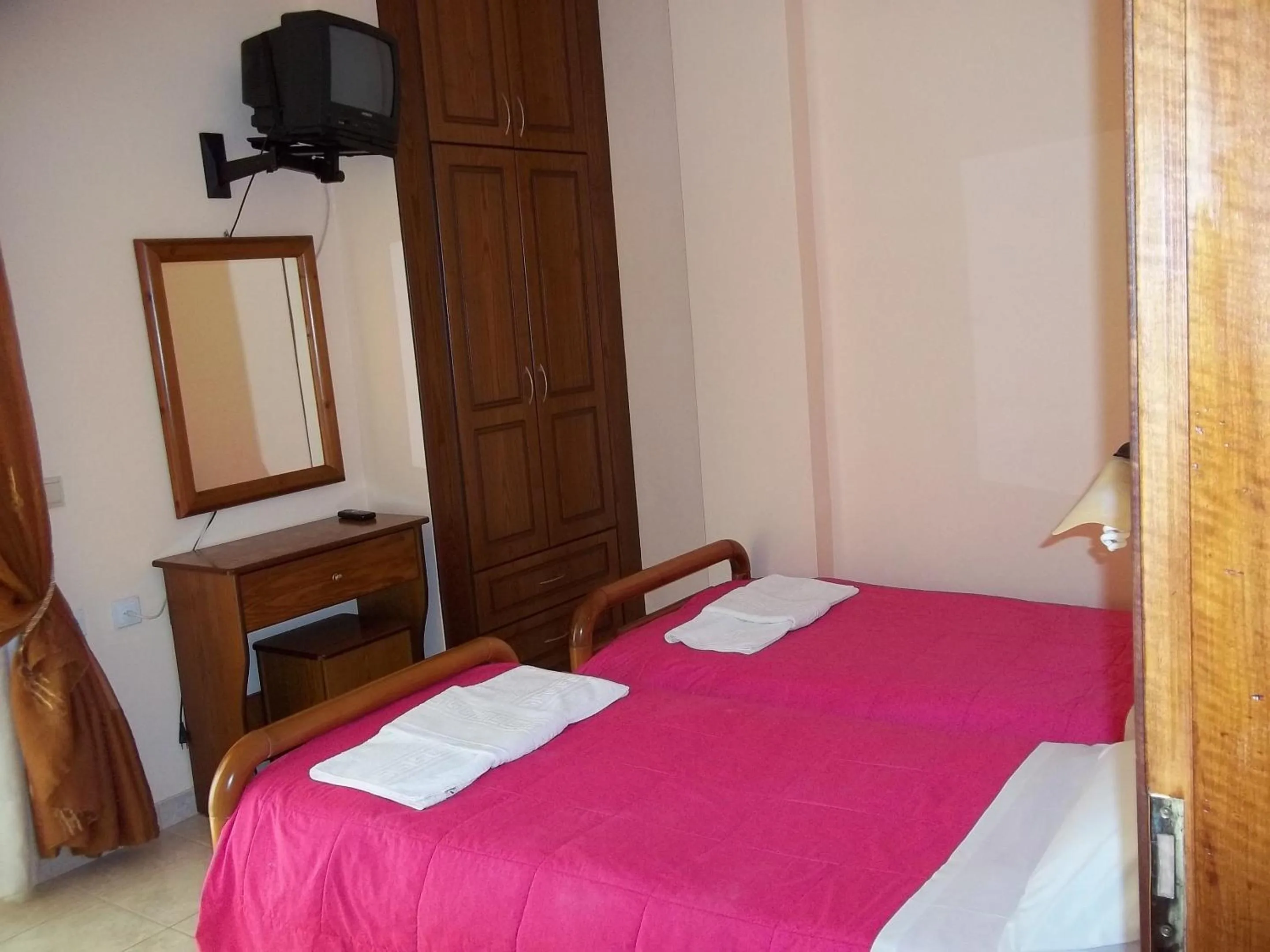 Bed in Toula's Apartments