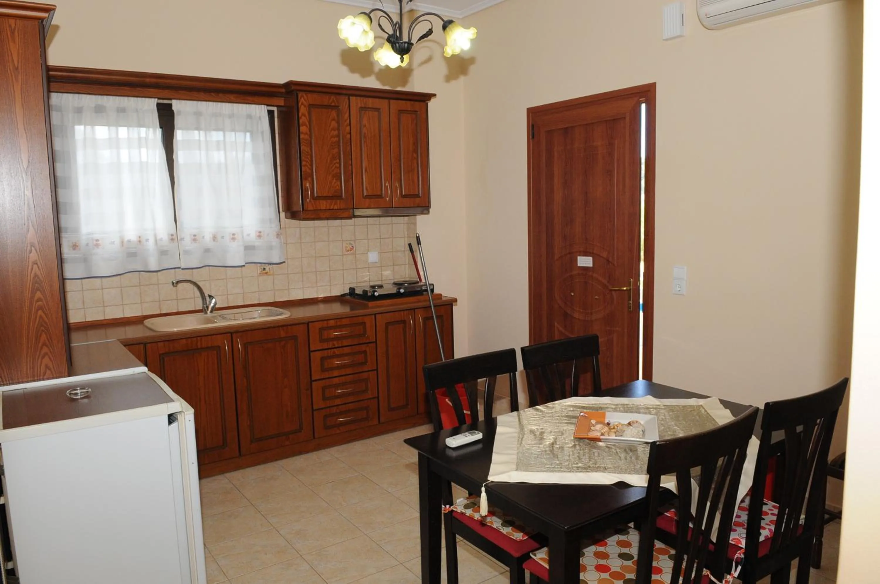 Kitchen or kitchenette in Toula's Apartments