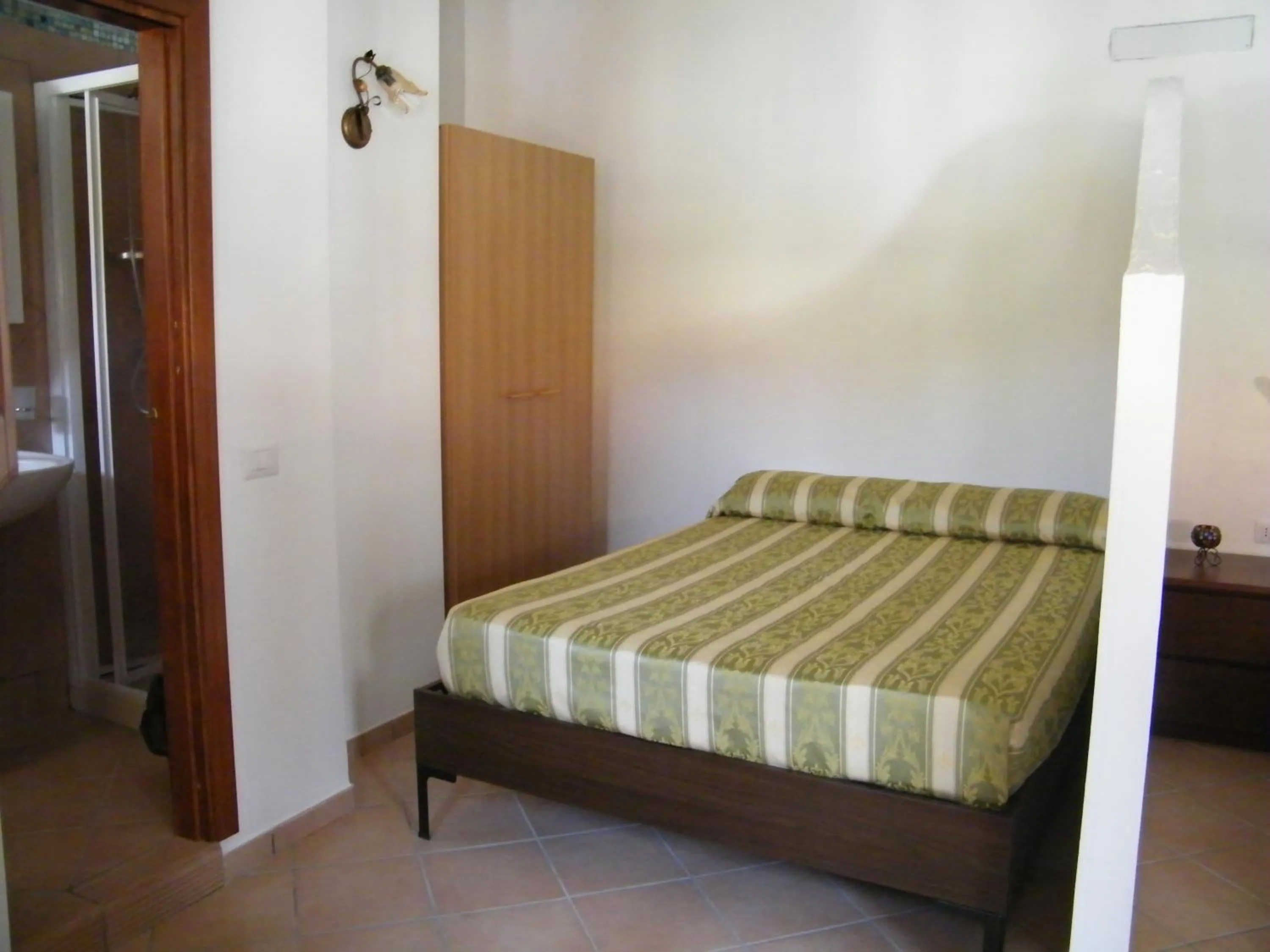 Bed in Hotel Villaggio Tabù