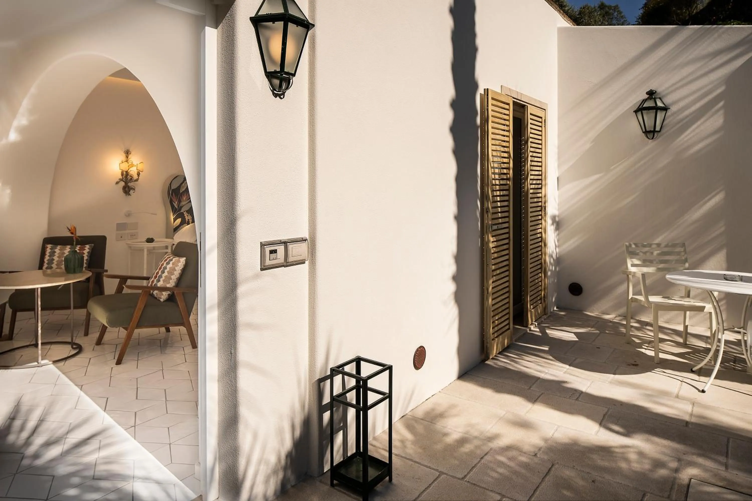 Patio, Bed in Botania Relais & Spa - The Leading Hotels of the World