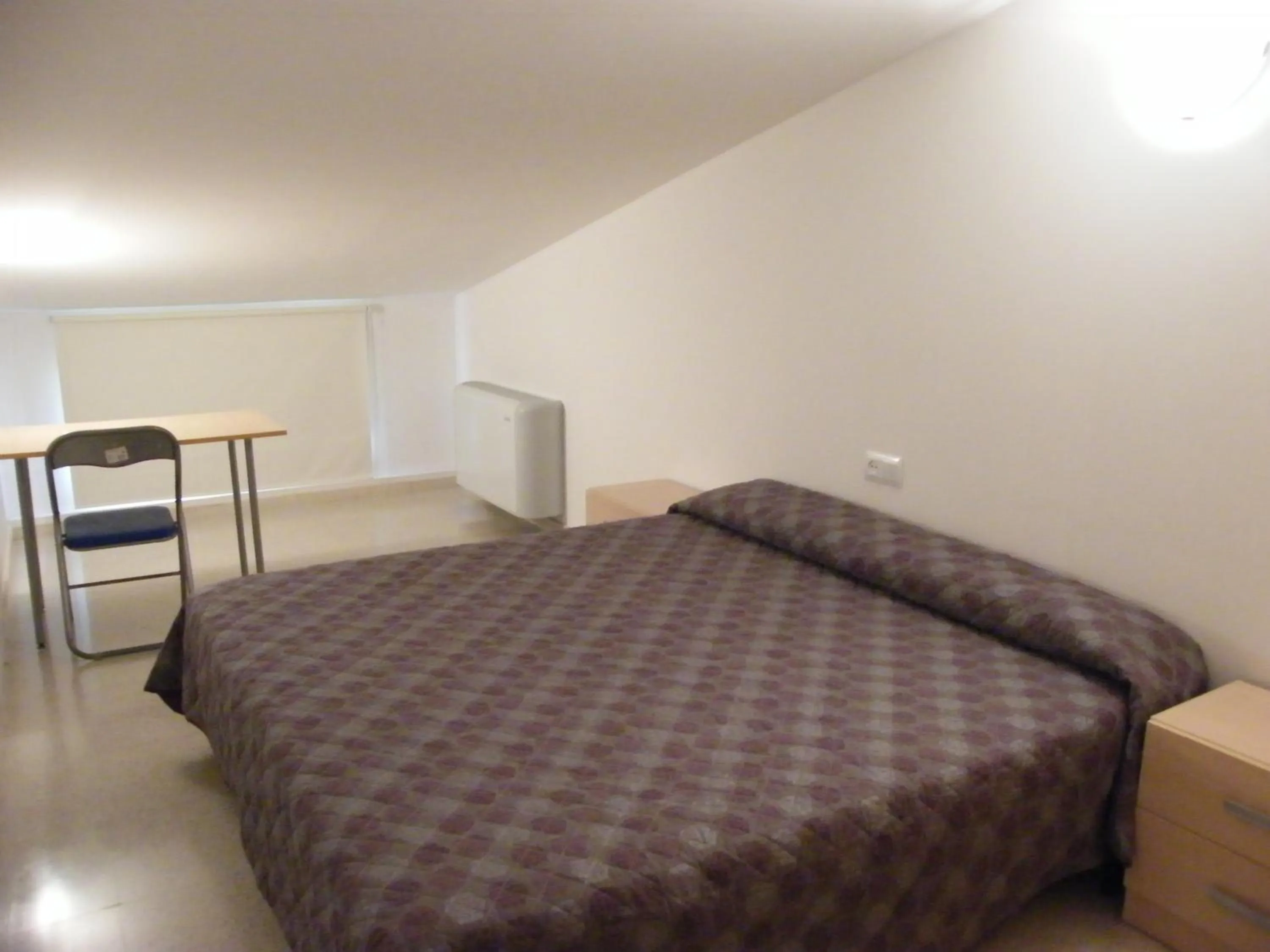 Photo of the whole room, Bed in Amolls Restaurant i Habitacions