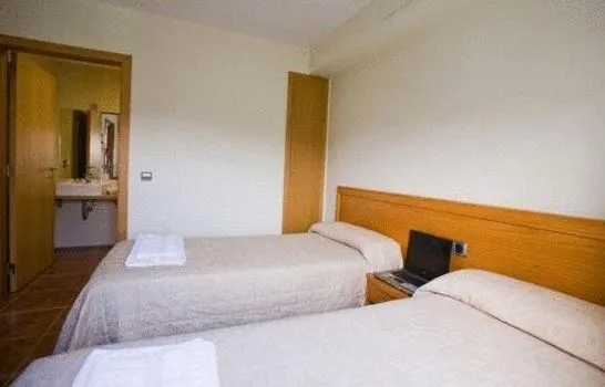 Photo of the whole room, Bed in Amolls Restaurant i Habitacions