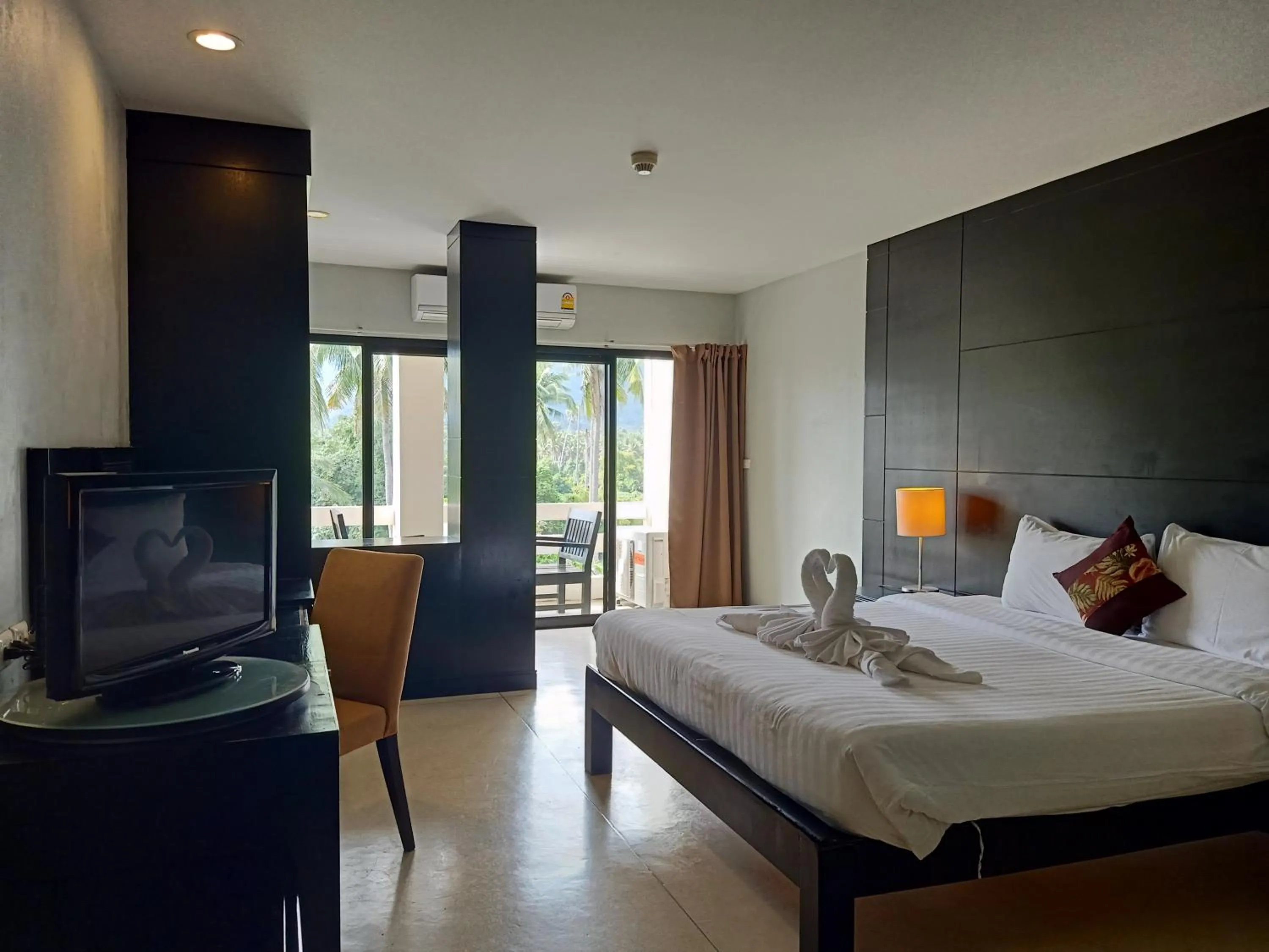 Photo of the whole room, Bed in Amarin Samui Hotel - SHA Plus Certified