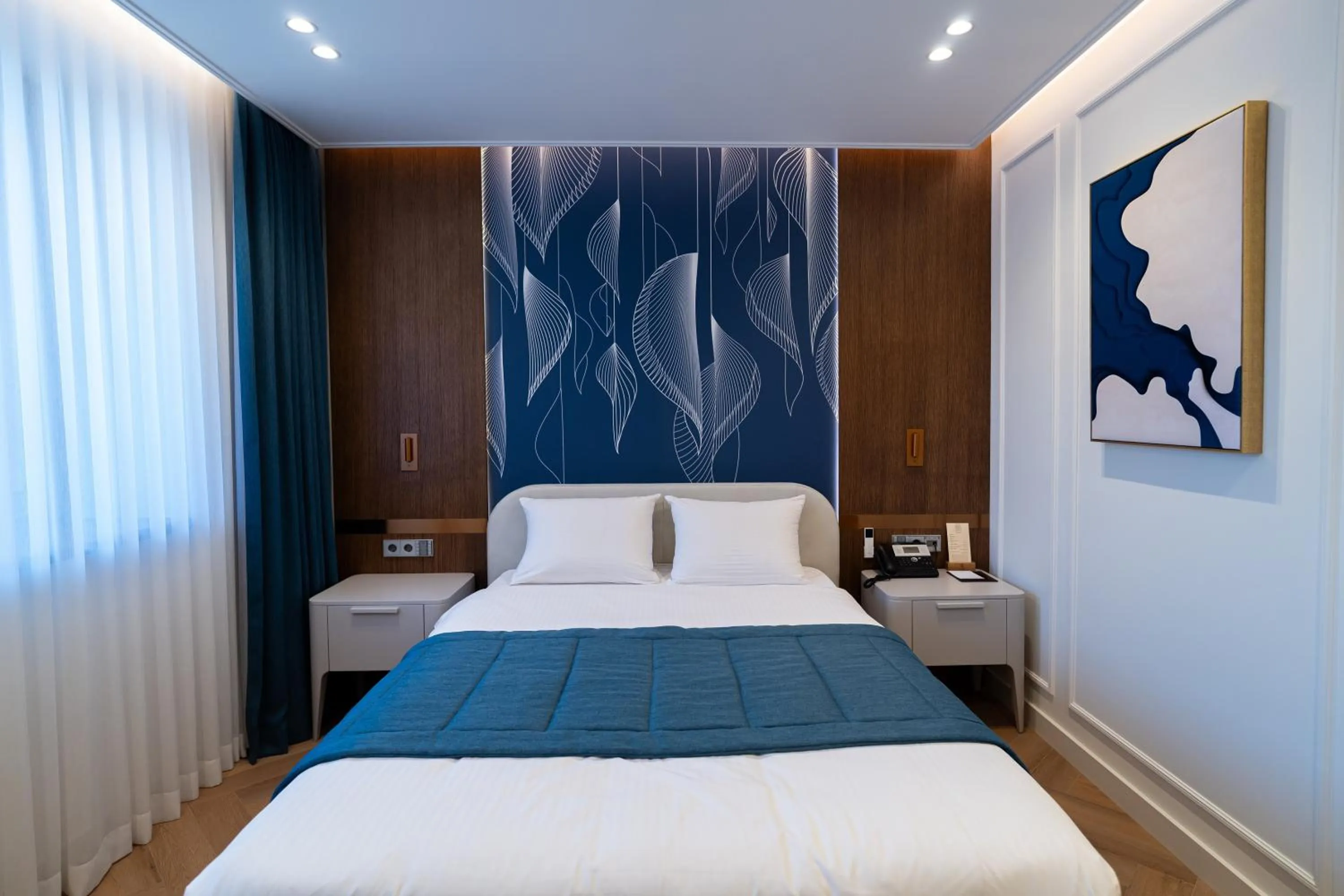 Bed in The Dostyk Hotel