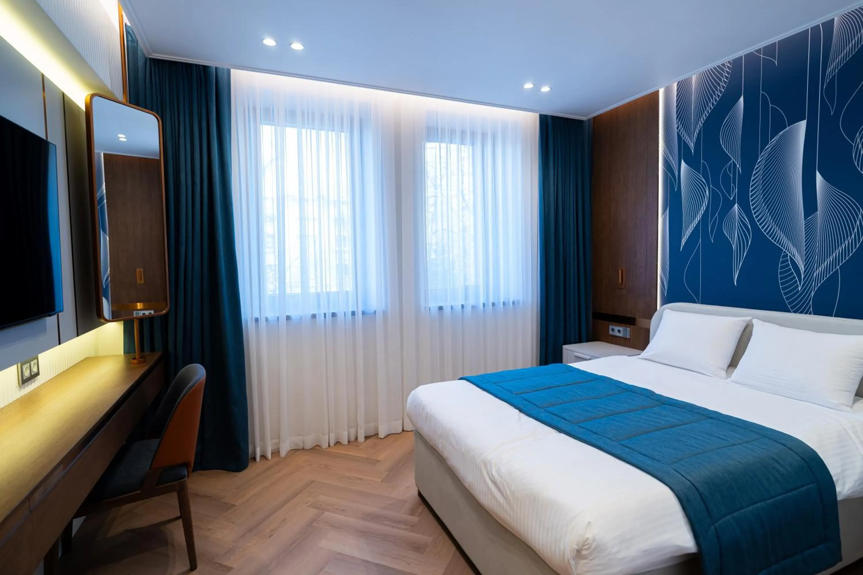 Bed in The Dostyk Hotel