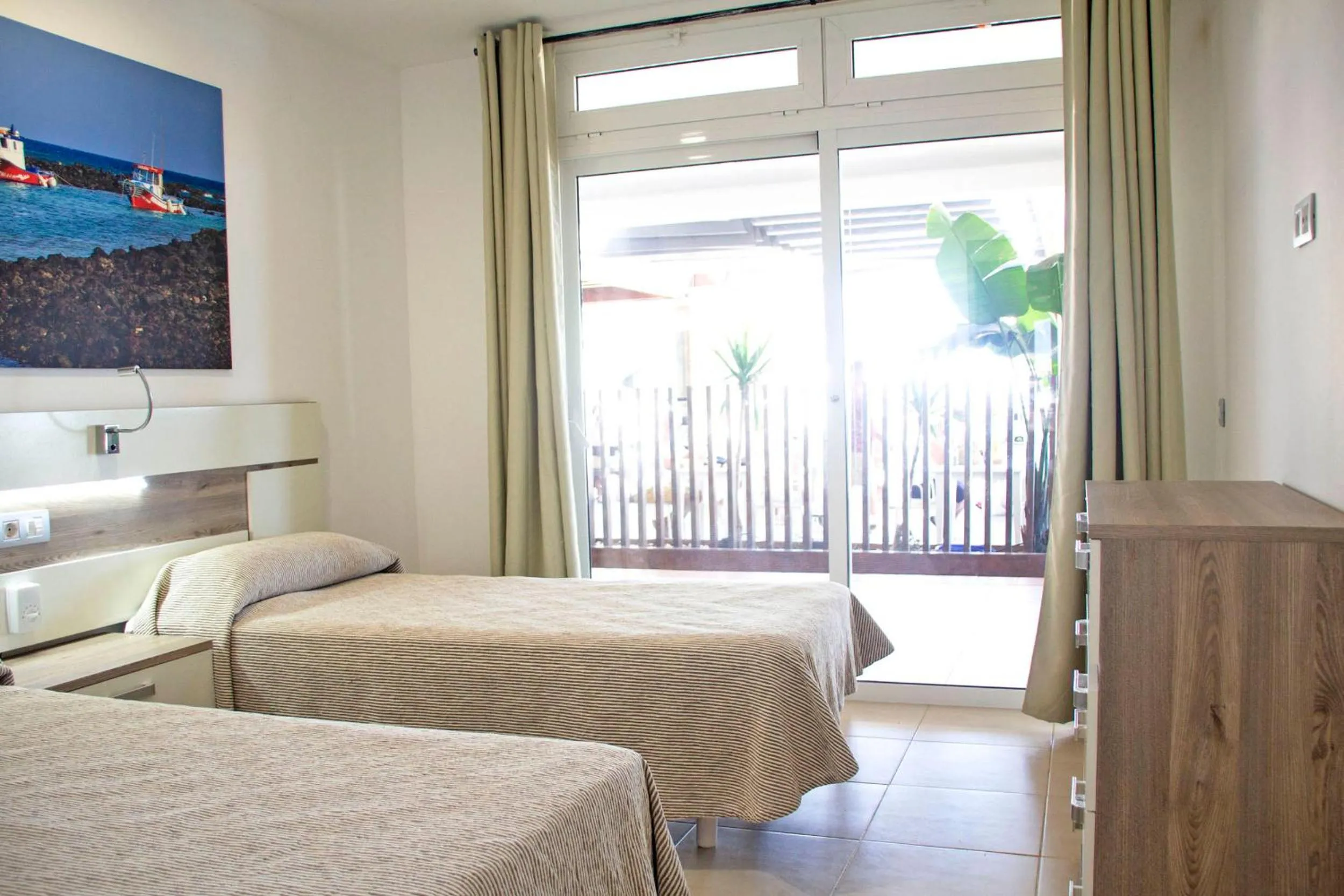 Photo of the whole room, Bed in TAO Caleta Playa