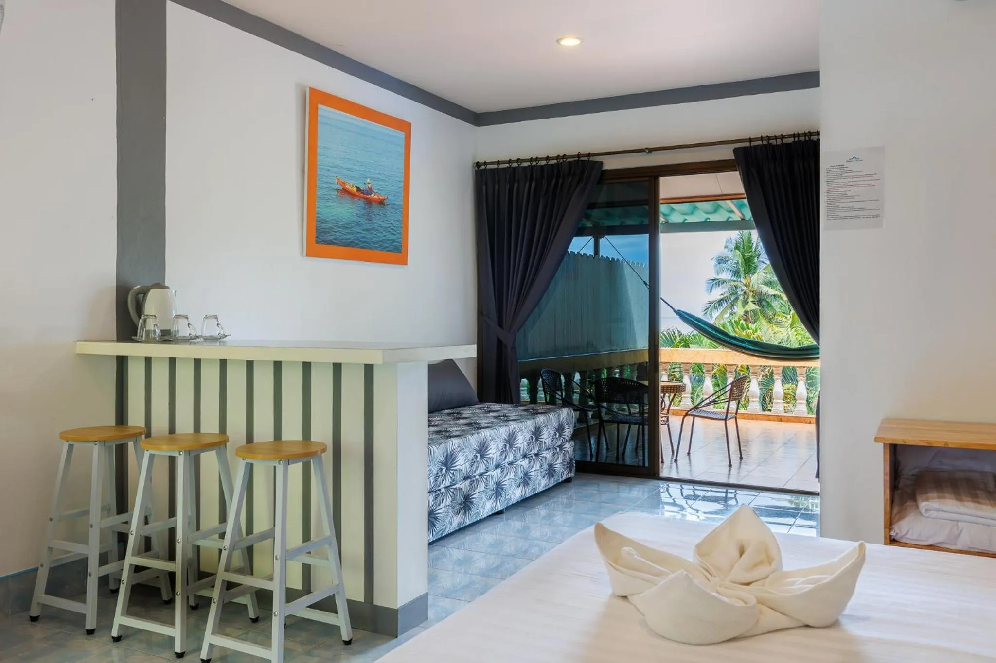 Seating area, Bed in Baan Kiao