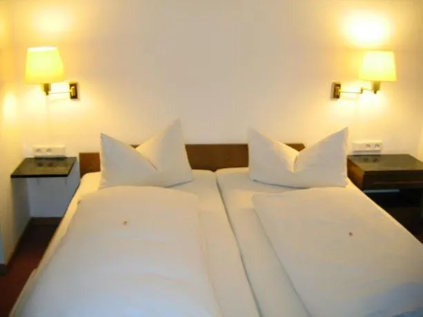Photo of the whole room, Bed in Eintracht Hotel