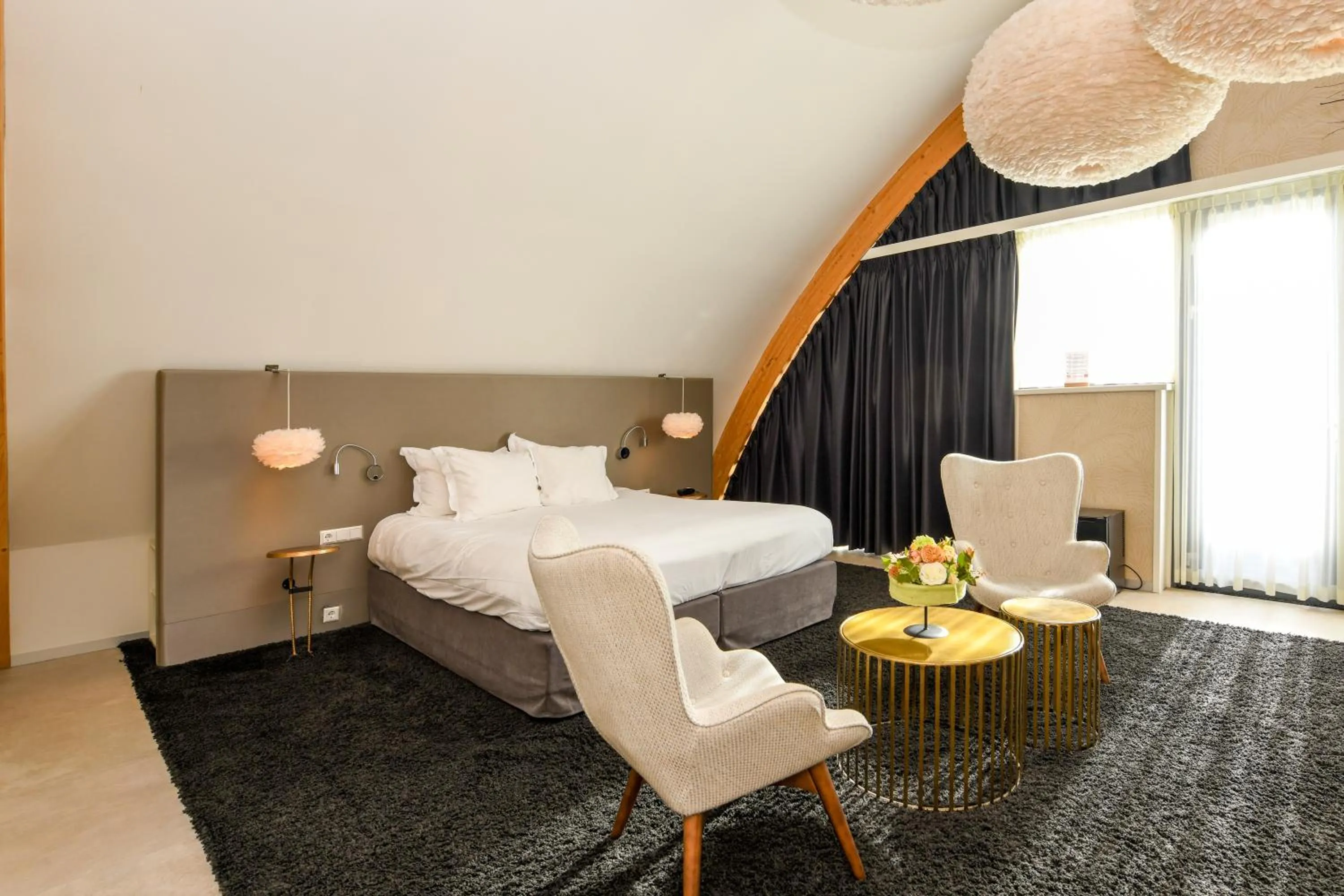 Bed in Hotel De Roode Schuur