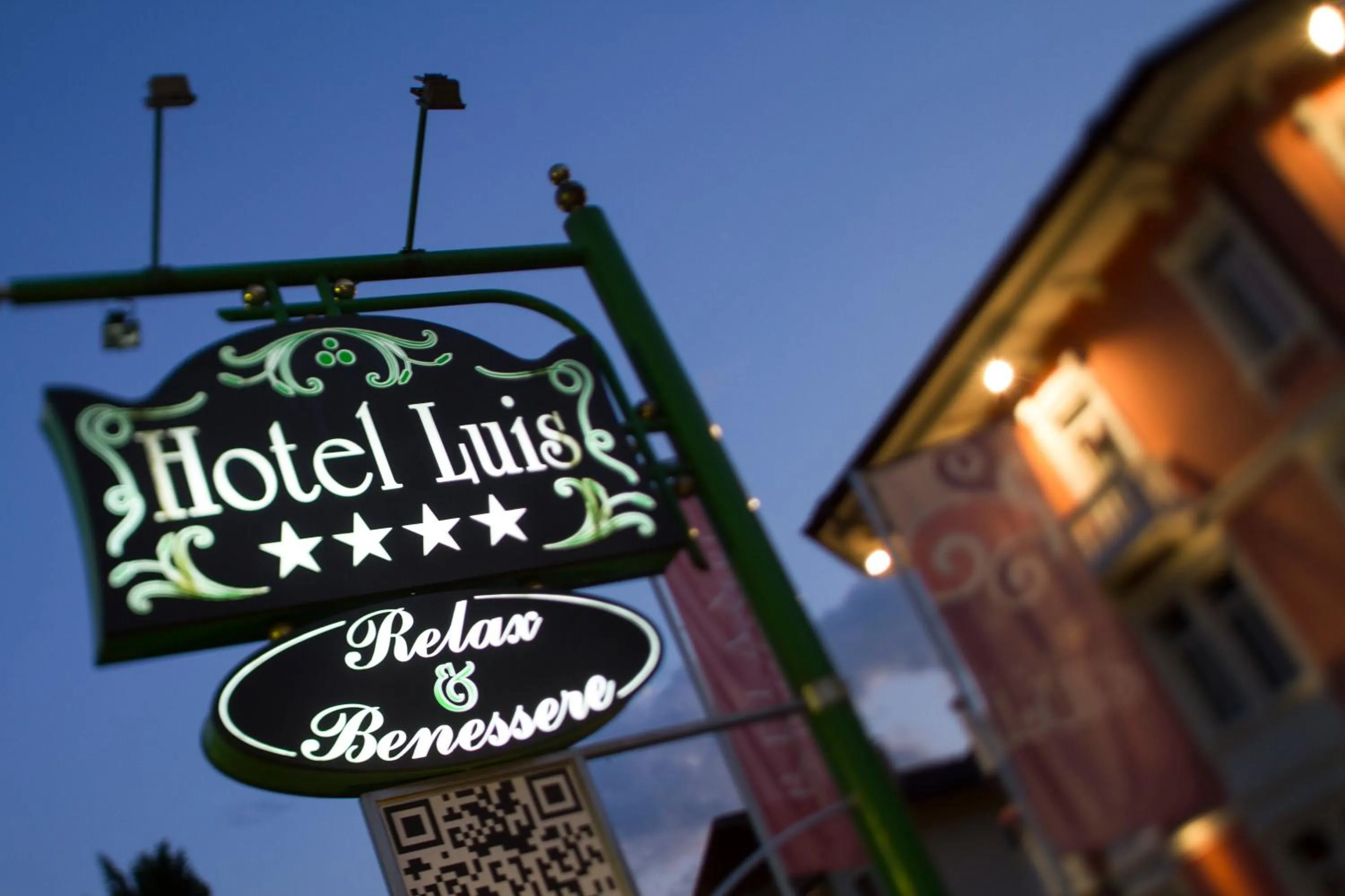 Property logo or sign in Hotel Luis