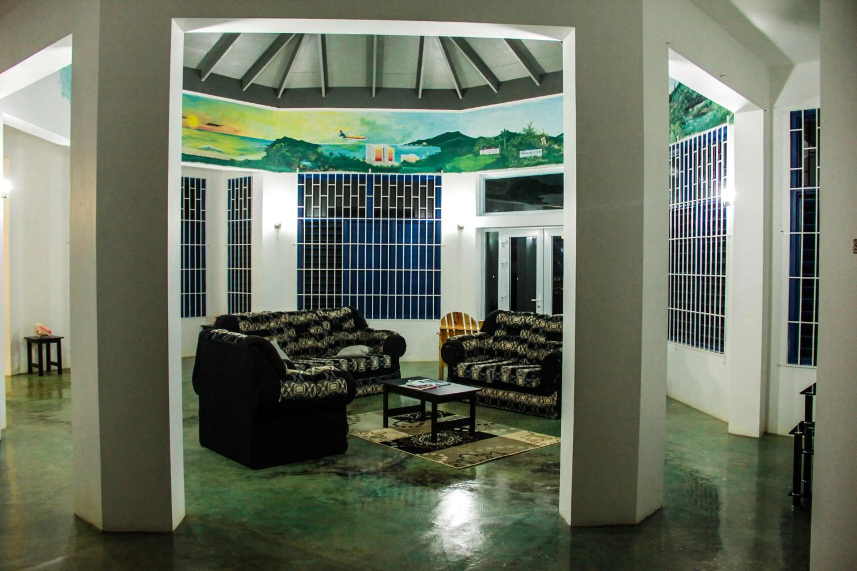 Communal lounge/ TV room in Sunshine Lodge: Your home away from home