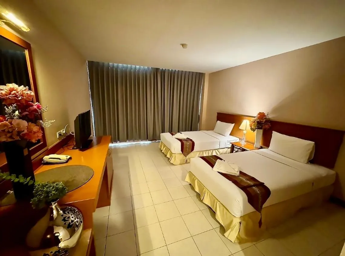 Bed in Crown Pattaya Beach Hotel