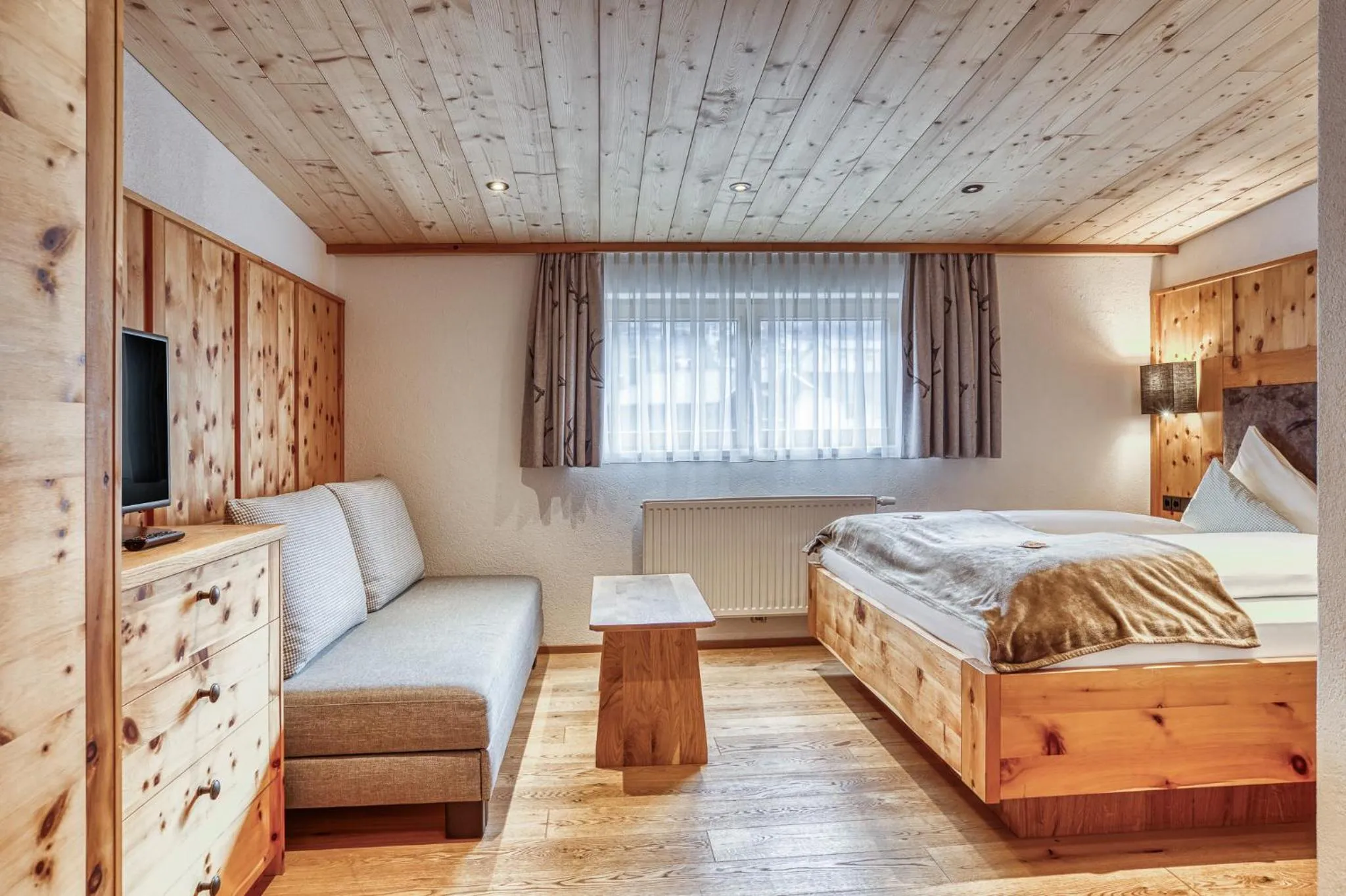 Photo of the whole room, Bed in Hotel Alpenstolz