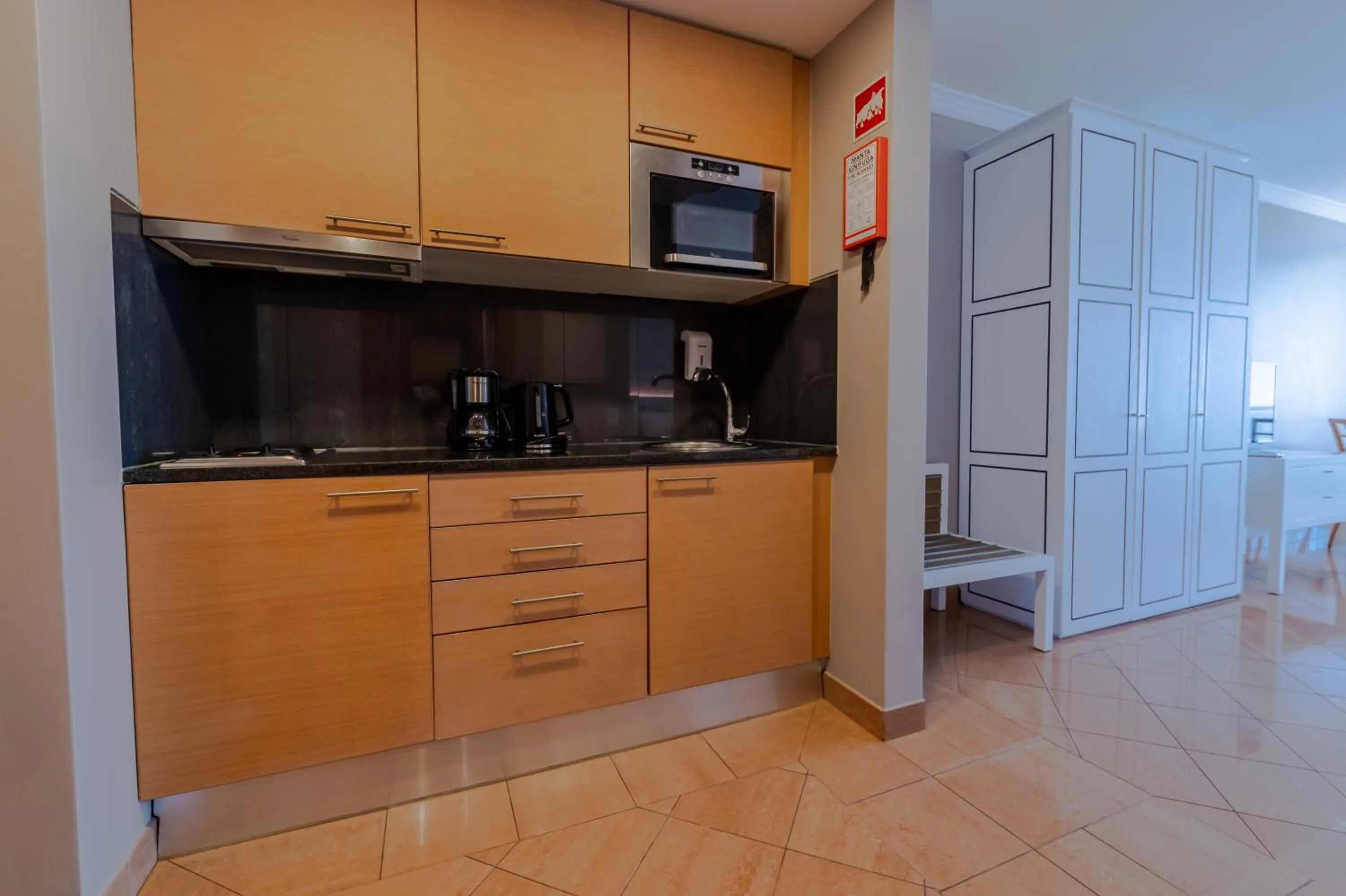 Kitchen or kitchenette in Pestana Alvor Park Suites Hotel