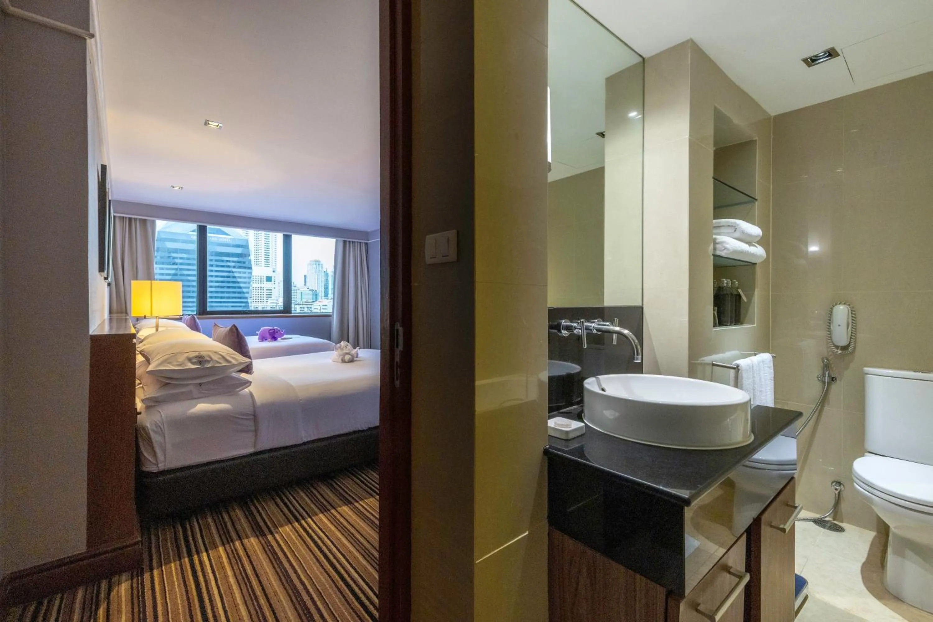 Toilet, Bed in The Sukosol Hotel