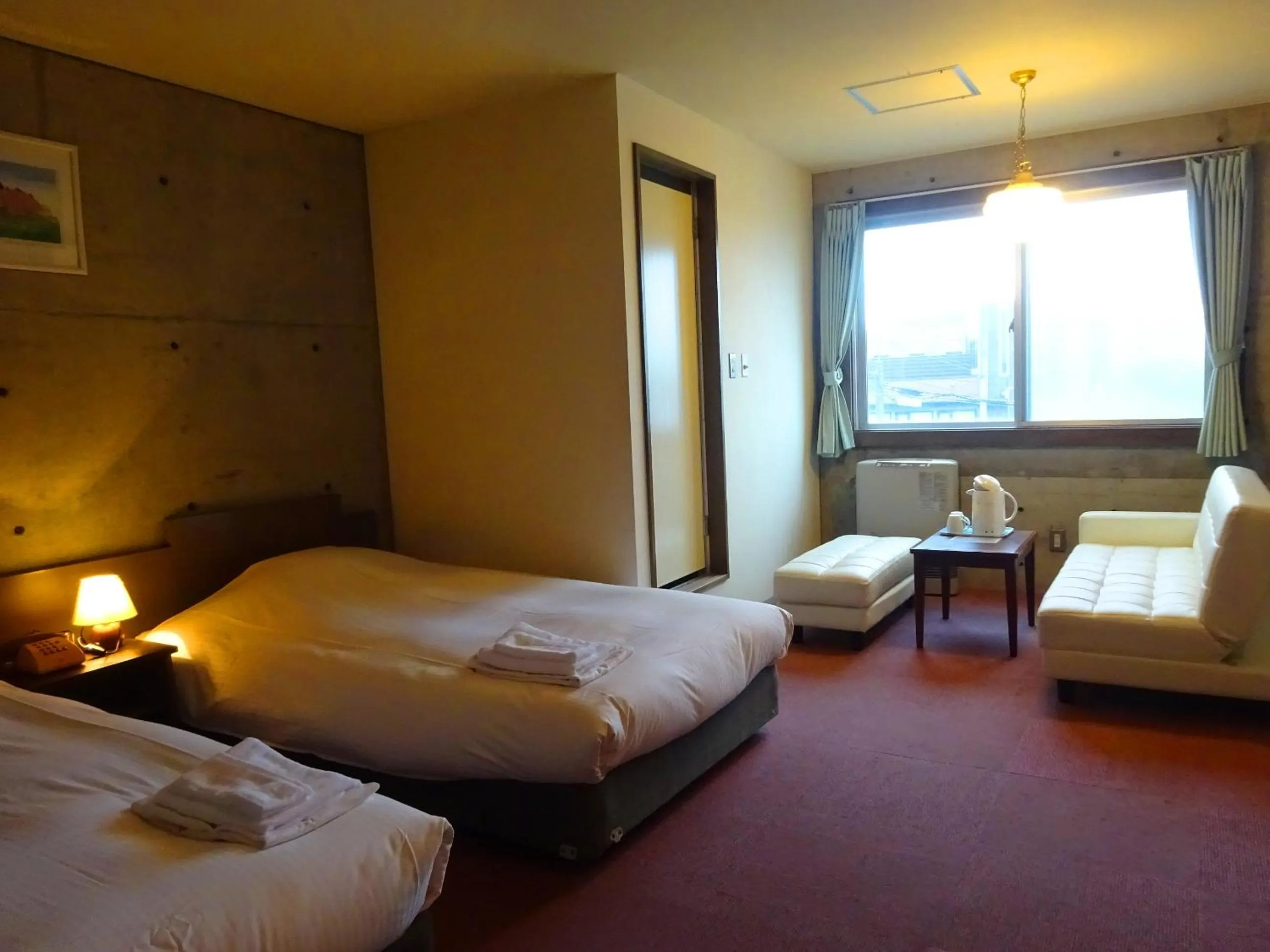 Bed in Hakodate Motomachi Hotel