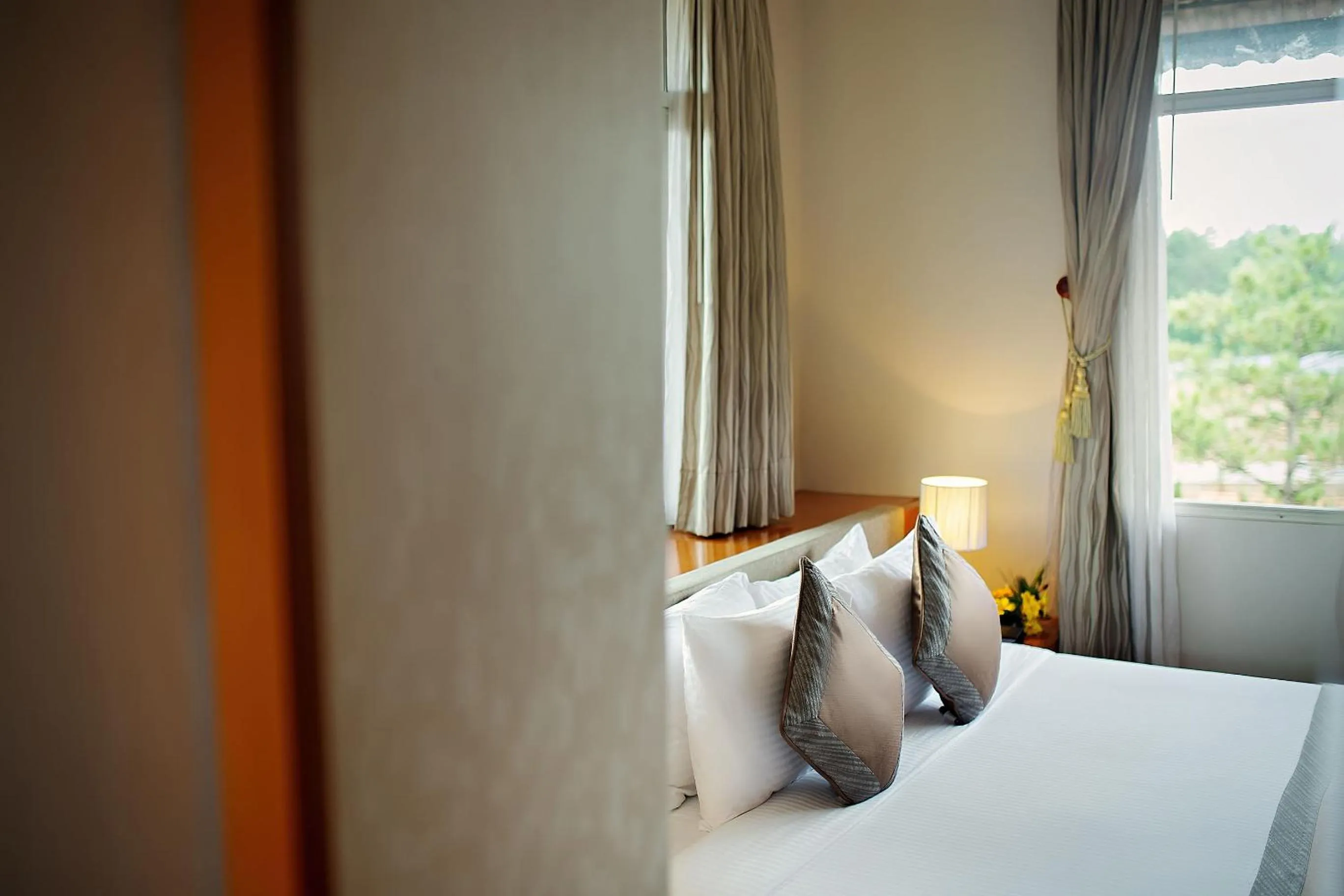 Bed in Muong Thanh Holiday Da Lat Hotel