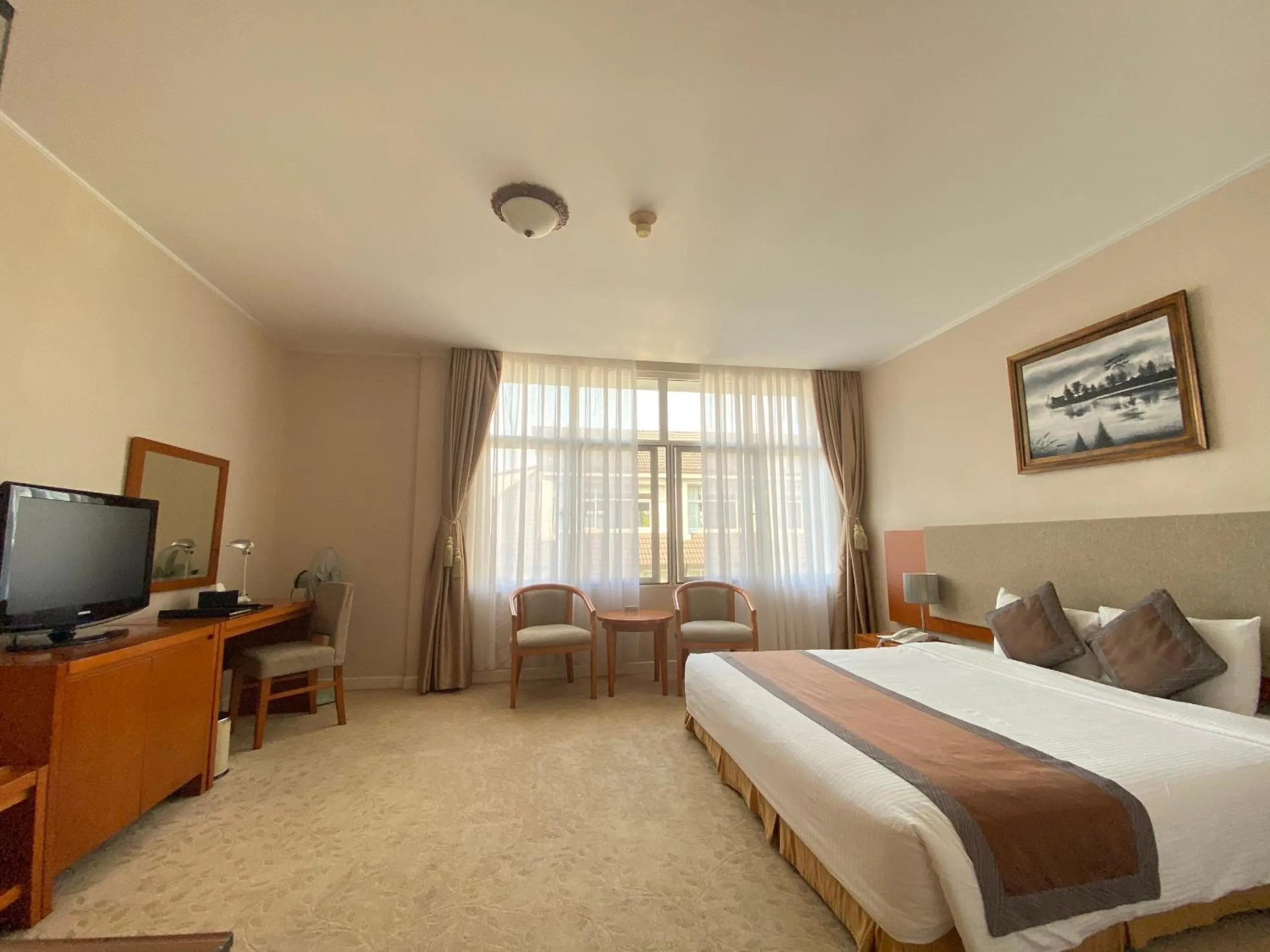 Bed in Muong Thanh Holiday Da Lat Hotel