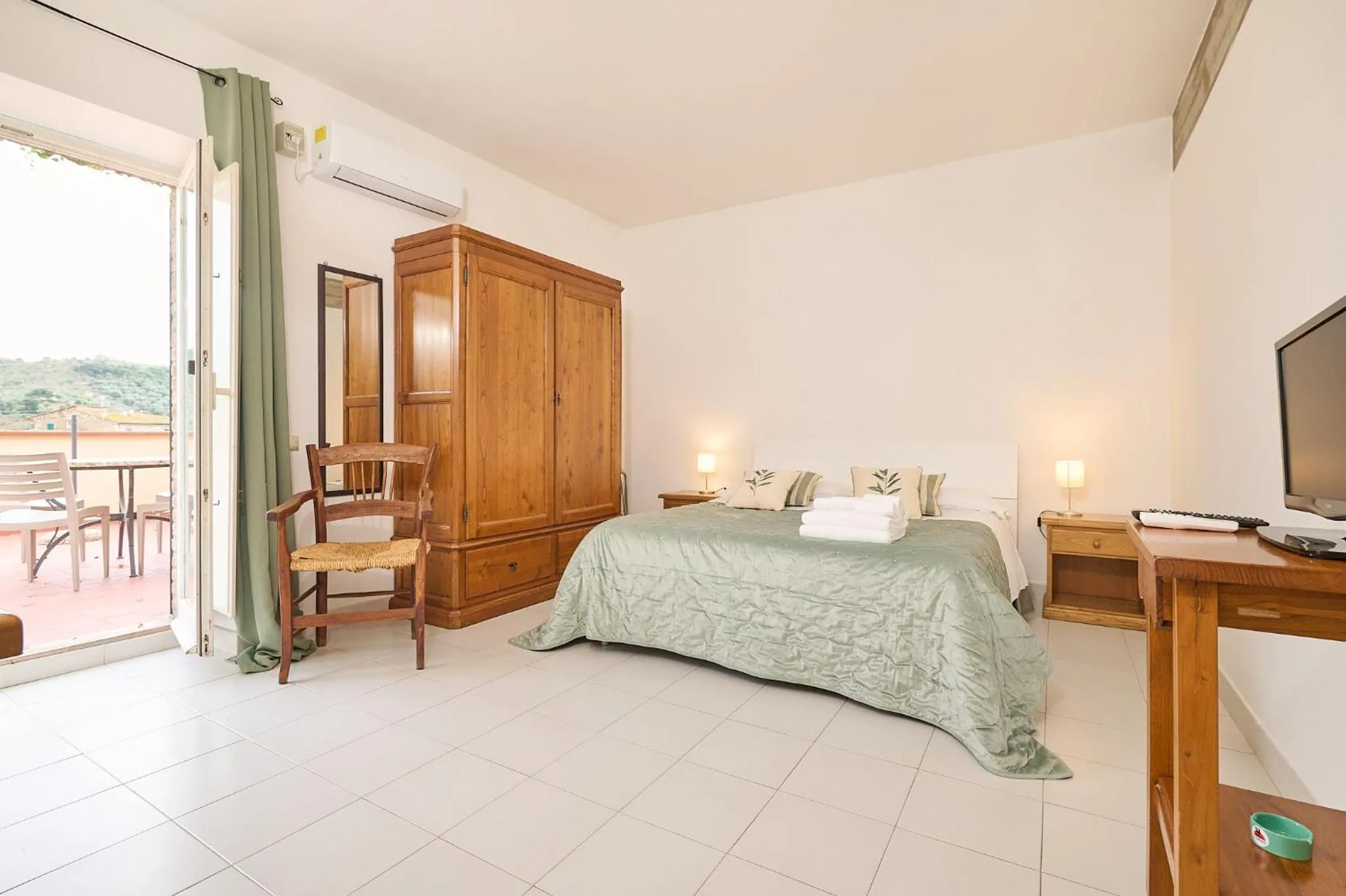 Bed in Il Chiostro Appartamenti & Suites
