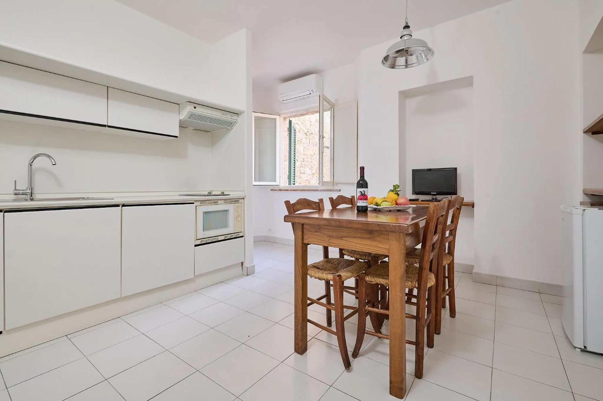 Kitchen or kitchenette in Il Chiostro Appartamenti & Suites
