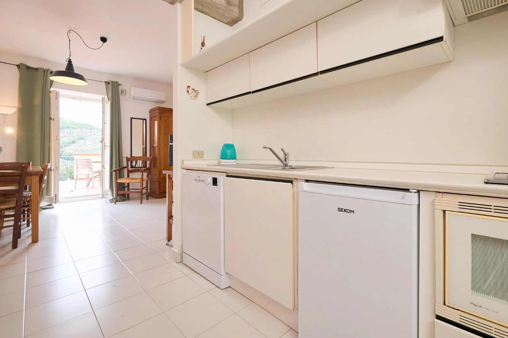 Kitchen or kitchenette in Il Chiostro Appartamenti & Suites