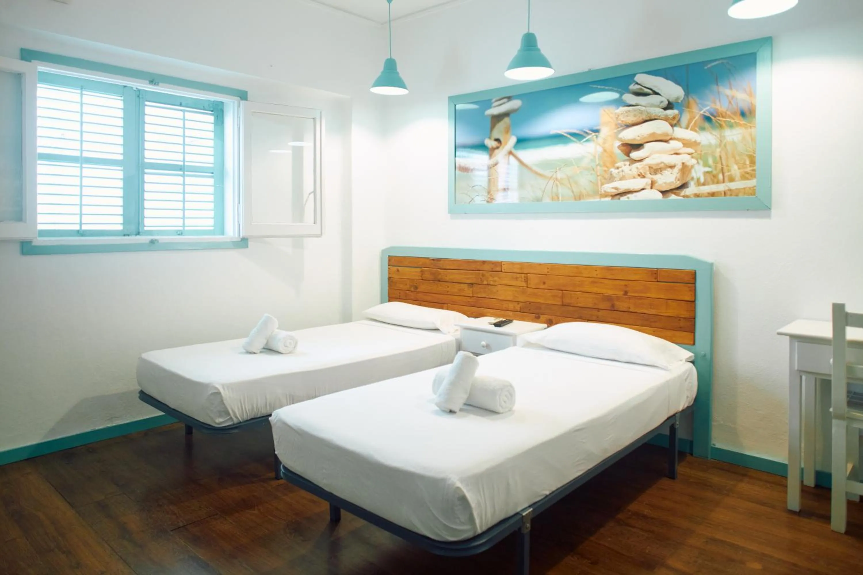 Bed in Hostal Sunset Ibiza