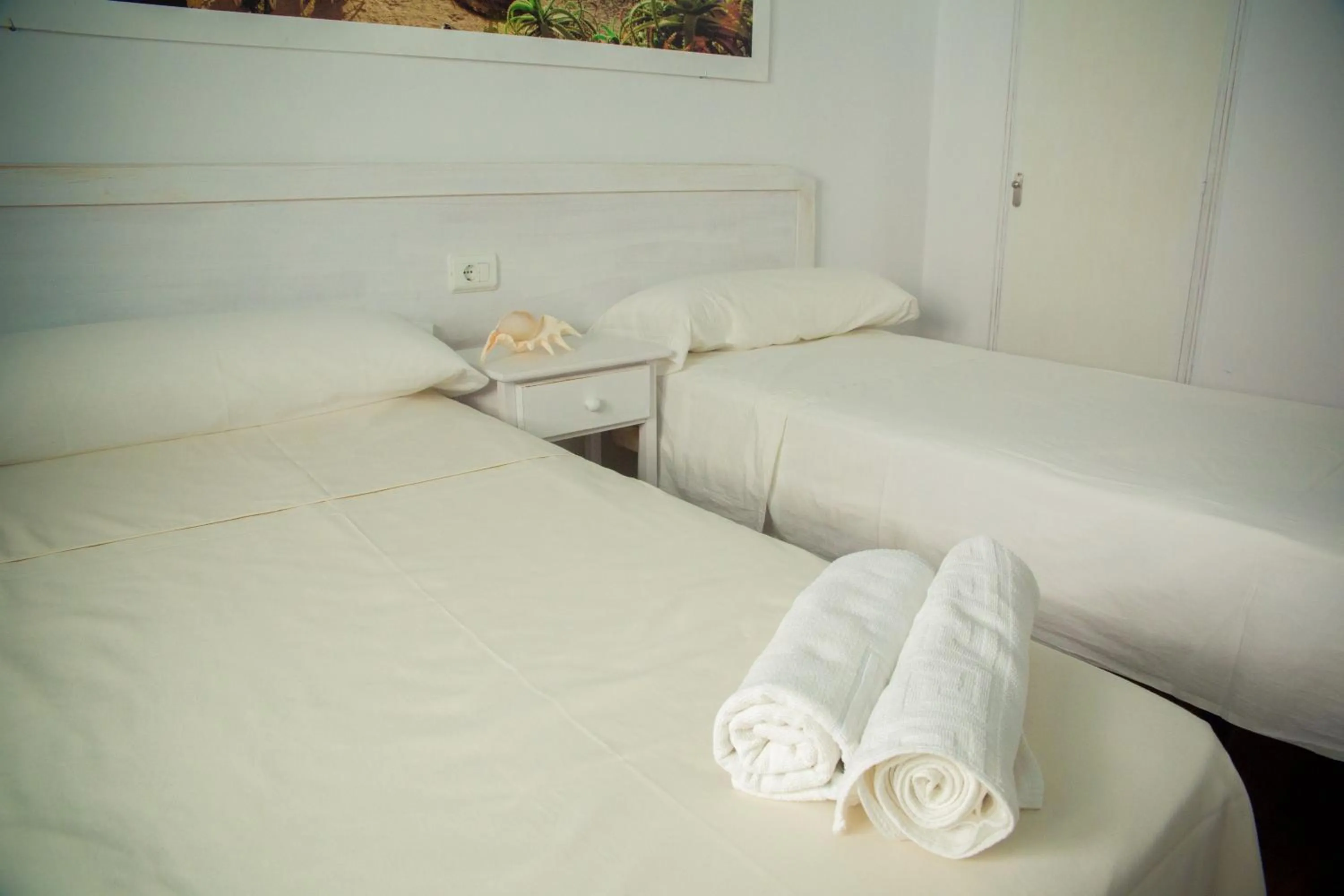 Bed in Hostal Sunset Ibiza
