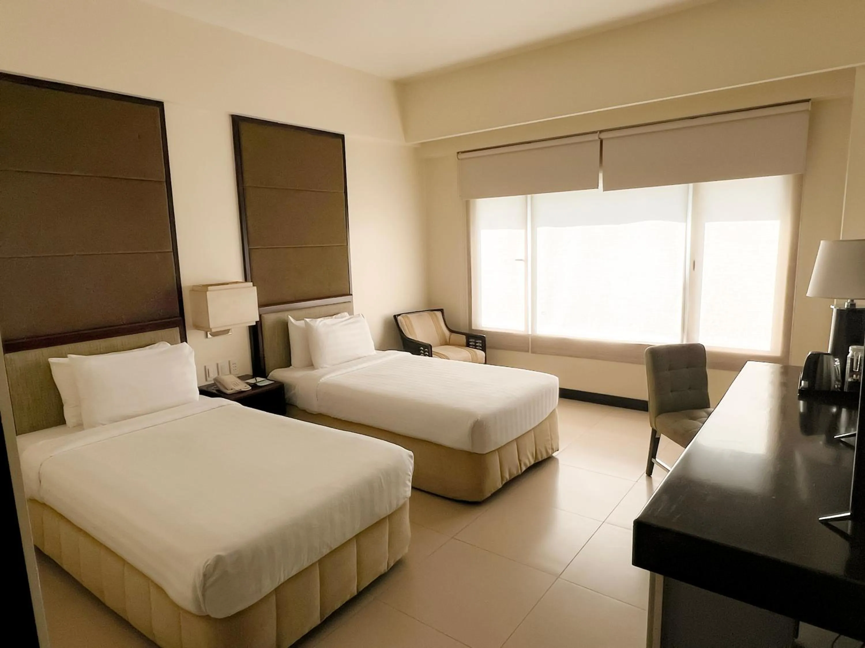 Bed in Taal Vista Hotel