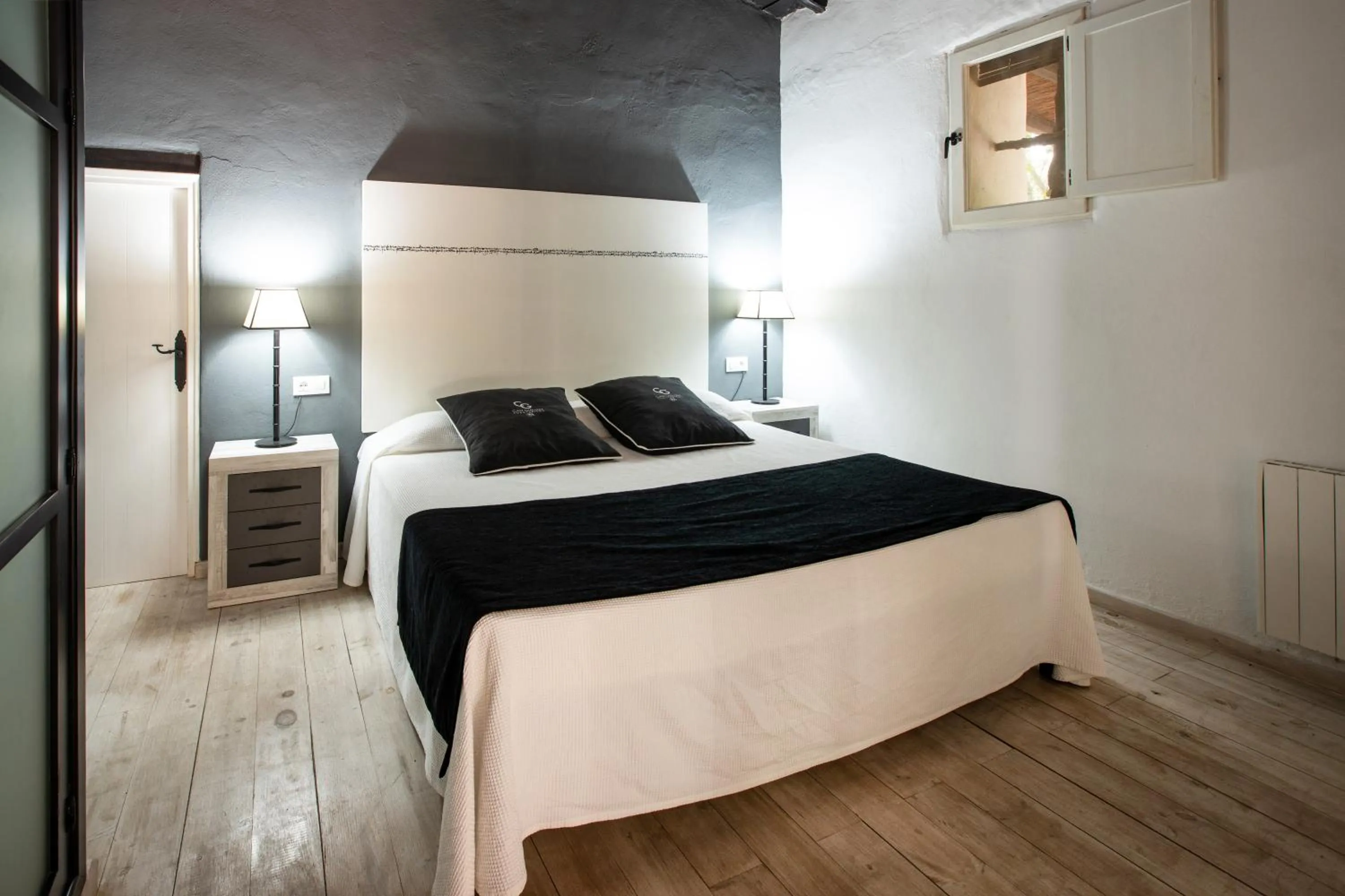 Bed in Agroturismo Can Guillem