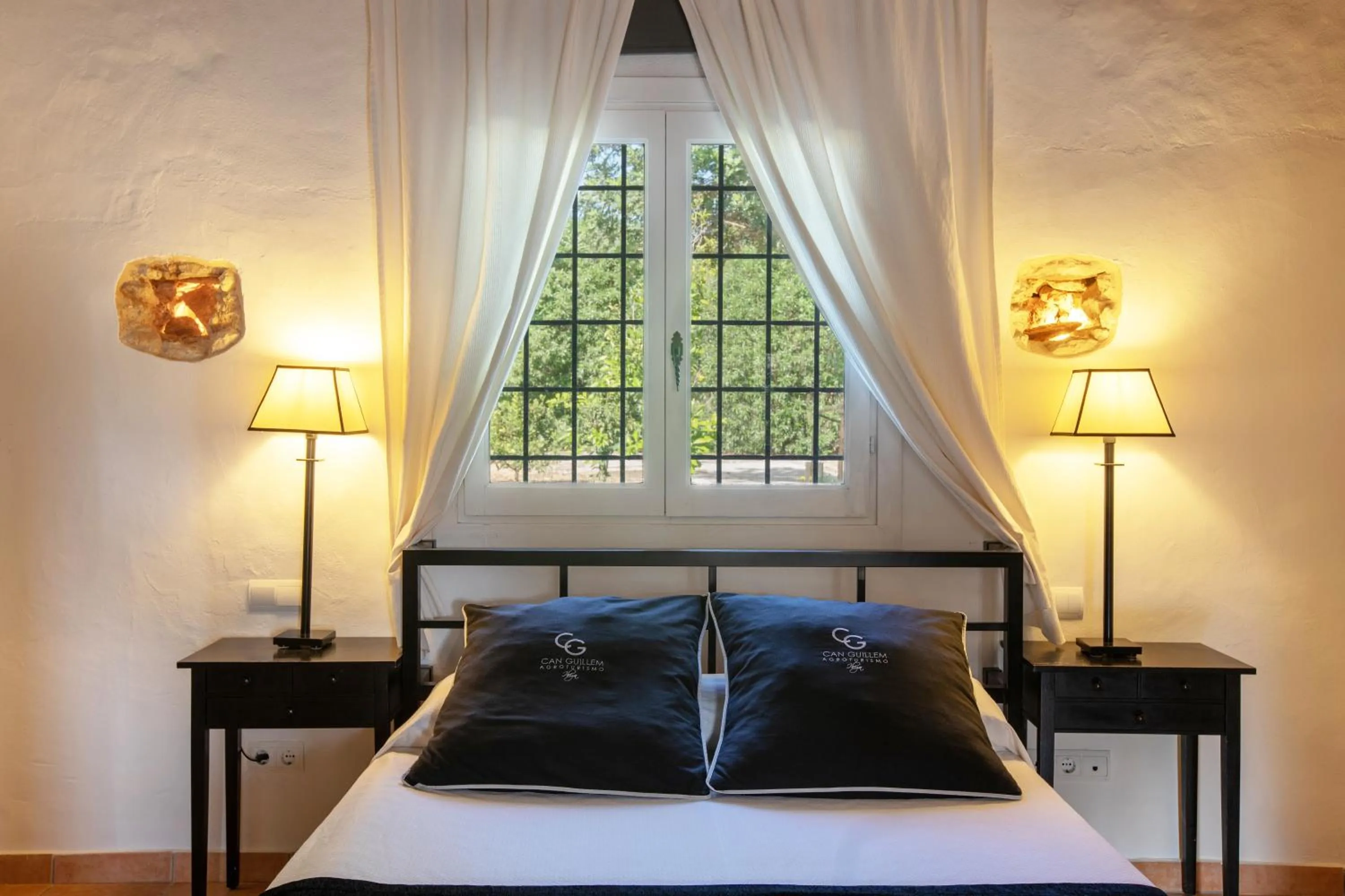 Bed in Agroturismo Can Guillem