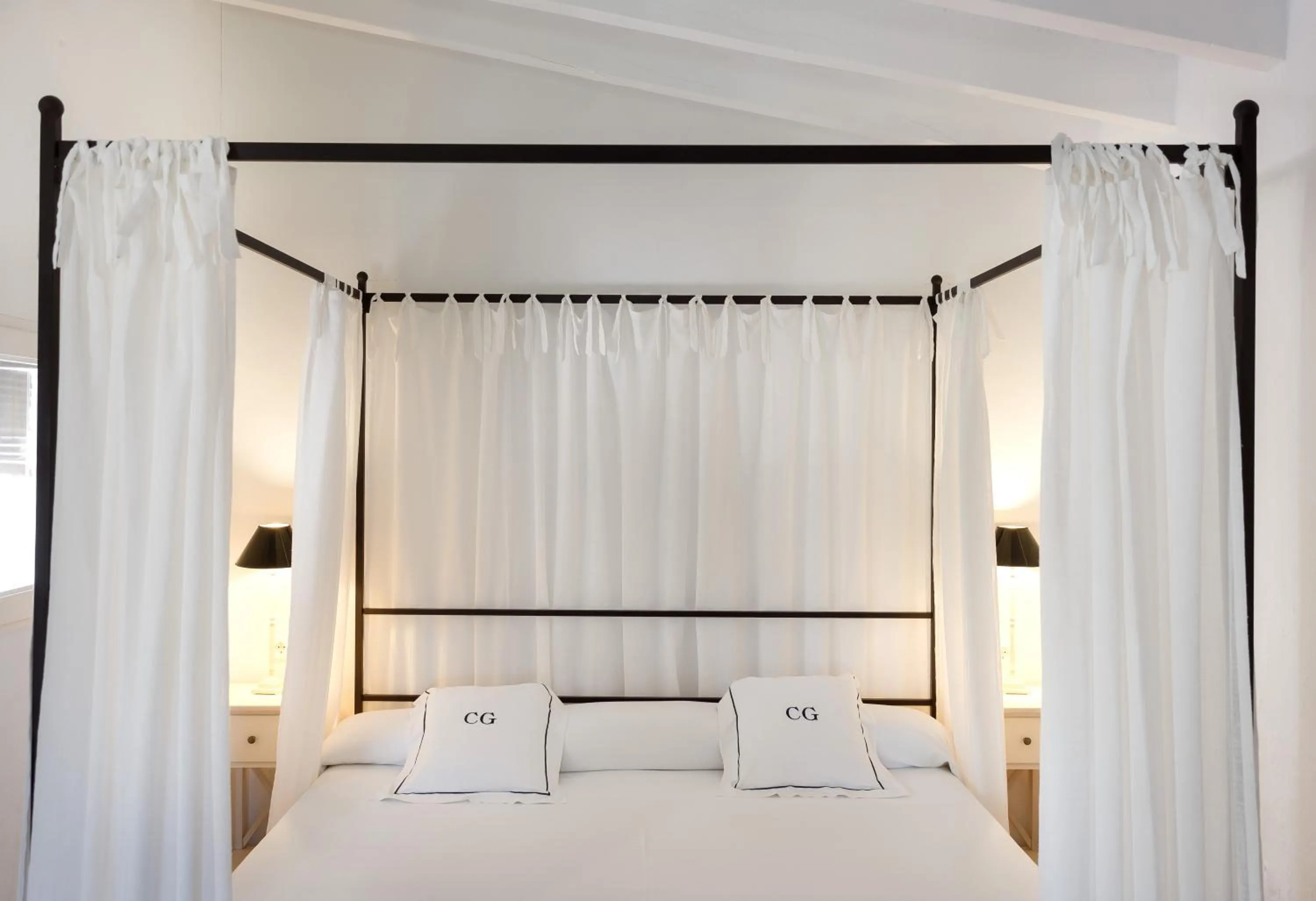 Bed in Agroturismo Can Guillem