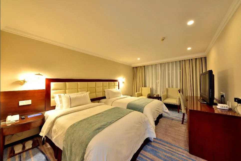 Bed in Hai Jun Hotel Guangzhou