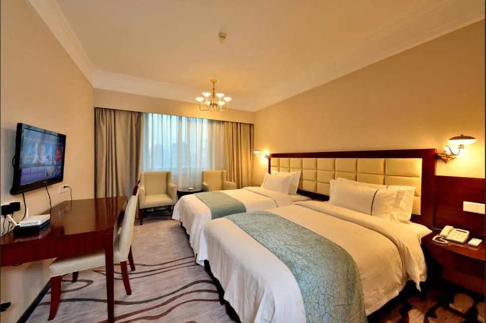 Bed in Hai Jun Hotel Guangzhou